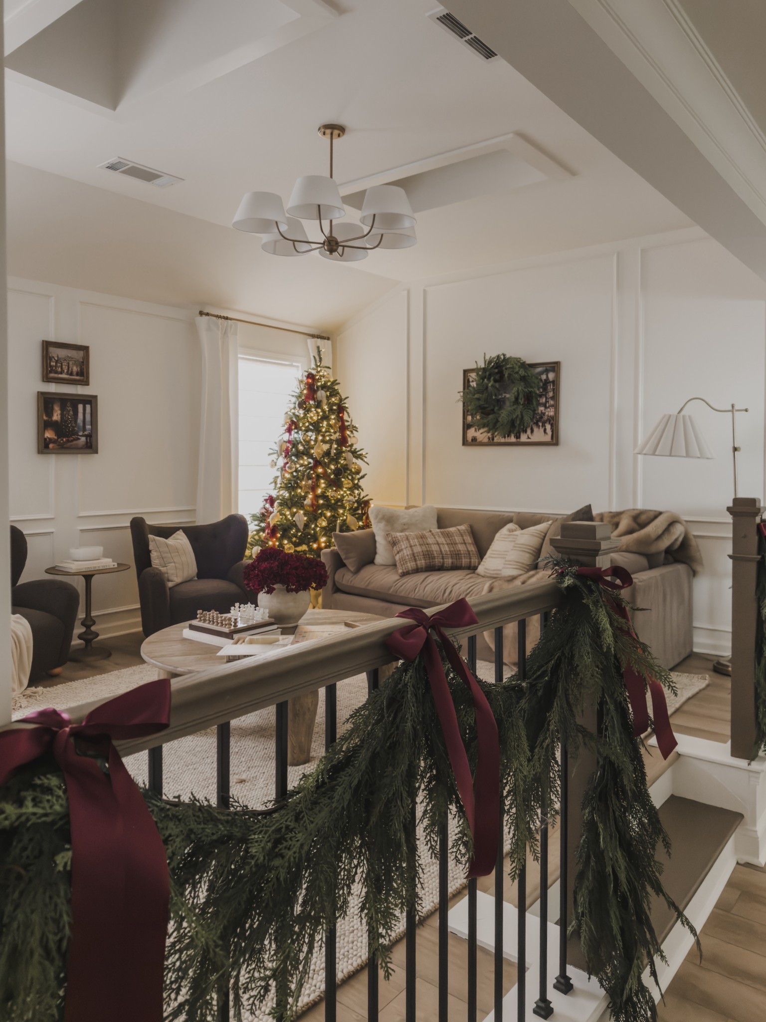 Cozy media center styling for the holidays! So much progress has been made in this space and loving this area the entire family has been loving.

Home finds, neutral home inspo, holiday home views, furniture favorites, neutral home inspo, velvet sofa, cozy accent chair, neutral area rug, faux garland, burgundy details, lighting detail, linen curtain, roman shades, Wayfair, collected style, found it on Amazon, Two Pages, accent table, Magnolia, shop the look!

#LTKHoliday #LTKSeasonal #LTKHome