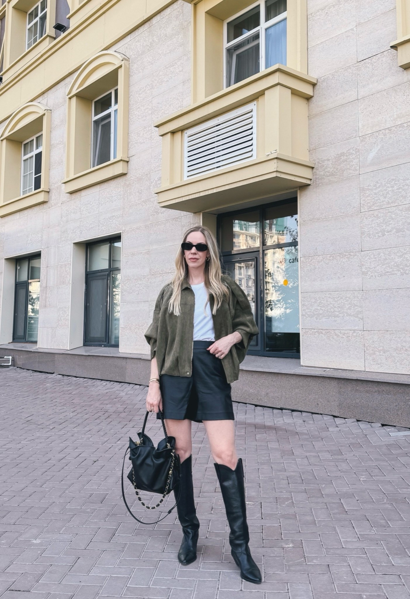 Faux suede bomber jacket with leather shorts and cowboy boots fall outfit

#LTKSeasonal #LTKOver40 #LTKSaleAlert