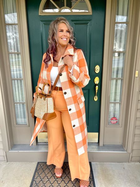 ✨SIZING•PRODUCT INFO✨
⏺ Peach Orange Gingham Coat - M - Runs TTS (I can’t button but prefer a fitted jacket - if you’re concerned about shoulders/arms, I’d size up)
⏺ Peach Orange Workwear Trouser Pants - XL - TTS leaning big 
⏺ Raffia Crossbody Bag - Walmart 
⏺ Scoopneck Ruffle Shoulder Ribbed Ivory Bodysuit - L - TTS (needs coverage underneath)
⏺ Cognac Braided Open Toe Sandal - TTS - Walmart 
⏺ Earrings - Walmart 
⏺ Cognac Belt - Walmart 

📍Say hi on YouTube•Tiktok•Instagram ✨”Jen the Realfluencer | Decent at Style”

👋🏼 Thanks for stopping by, I’m excited we get to shop together!

🛍 🛒 HAPPY SHOPPING! 🤩

#walmart #walmartfinds #walmartfind #walmartfall #founditatwalmart #walmart style #walmartfashion #walmartoutfit #walmartlook  #workwear #work #outfit #workwearoutfit #workwearstyle #workwearfashion #workwearinspo #workoutfit #workstyle #workoutfitinspo #workoutfitinspiration #worklook #workfashion #officelook #office #officeoutfit #officeoutfitinspo #officeoutfitinspiration #officestyle #workstyle #workfashion #officefashion #inspo #inspiration #slacks #trousers #professional #professionalstyle #professionaloutfit #professionaloutfitinspo #professionaloutfitinspiration #professionalfashion #professionallook #dresspants #spring #springstyle #springoutfit #springoutfitidea #springoutfitinspo #springoutfitinspiration #springlook #springfashion #springtops #springshirts #springsweater #orange #outfit #orangeoutfit #orangeoutfitinspo #orangeoutfitinspiration #orangelook #orangestyle #orangefashion #outfitwithorange #lookwithorange #withorange #featuringorange #colorful #colorfuloutfit #colorfullook #colorfulinspo 
#bodysuit #bodysuits #bodysuitlook #tank #tankbodysuit #bodysuitfashion #bodysuitoutfit #bodysuitoutfitinspiration #bodysuitoutfitinspo #lookswithbodysuits #outfitwithbodysuit #bodysuitstyle #stylewithbodysuit 
#under10 #under20 #under30 #under40 #under50 #under60 #under75 #under100 #affordable #budget #inexpensive #budgetfashion 

#LTKSeasonal #LTKunder50 #LTKcurves