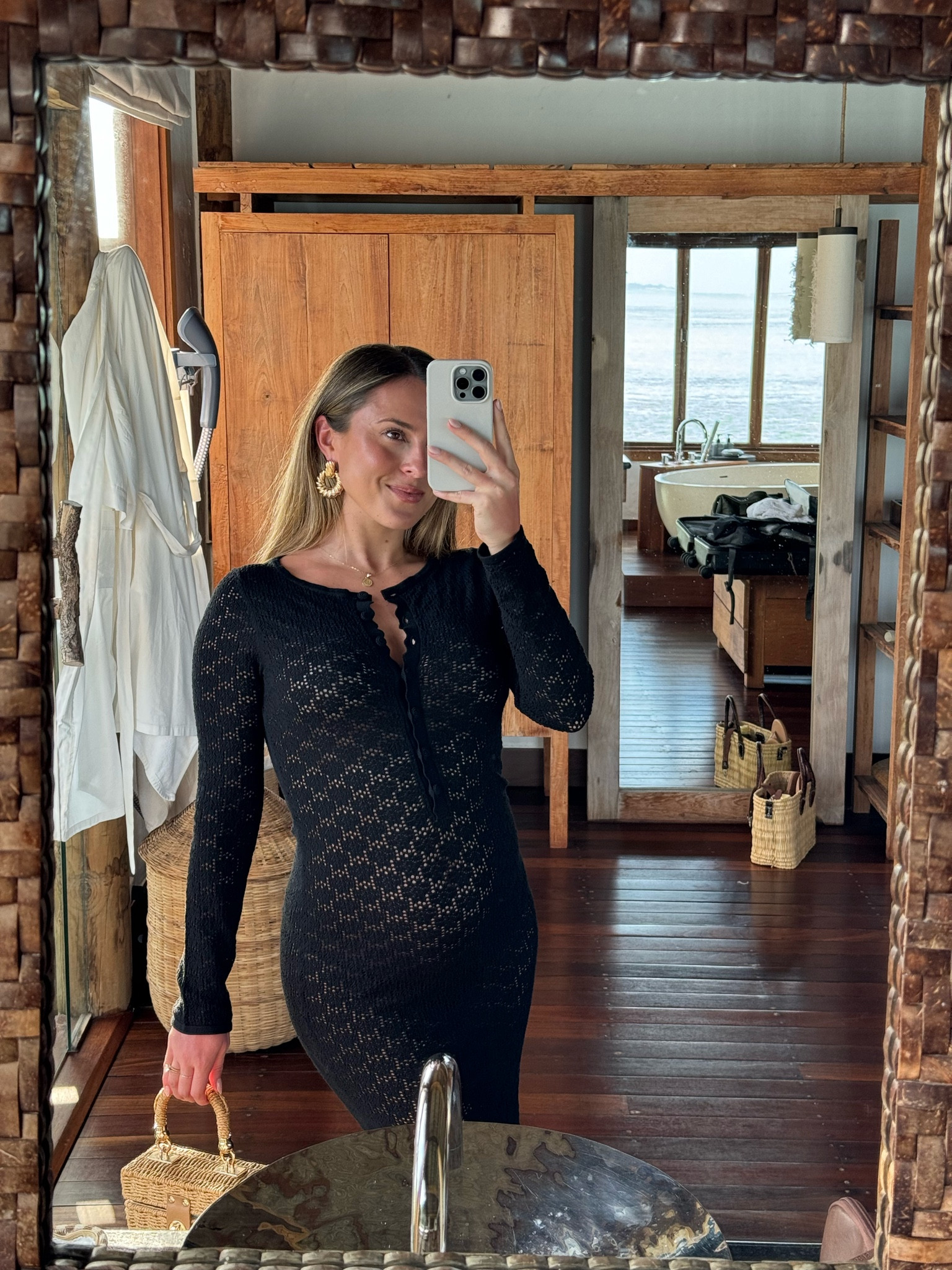 Wearing medium in the dress, small in the swimsuit bottoms 