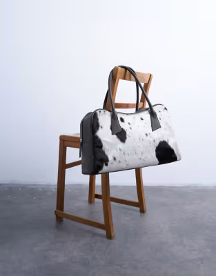 Topshop Suki real leather shoulder bowler bag in cow print pony | ASOS (Global)