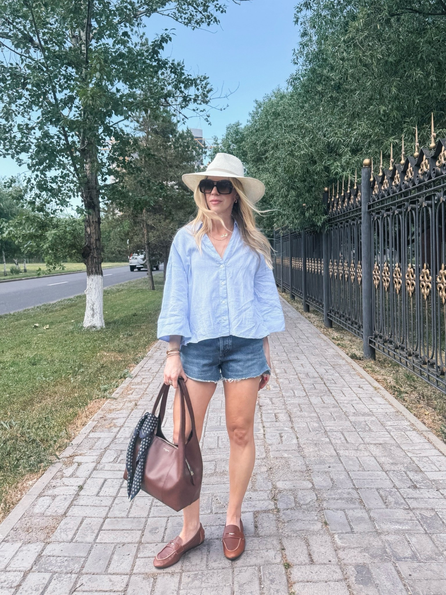 Casual summer outfit, blue linen shirt, denim cutoff shorts, @Janessa Leone straw hat, @Zara leather loafers, vacation outfit

#LTKSaleAlert #LTKOver40 #LTKTravel