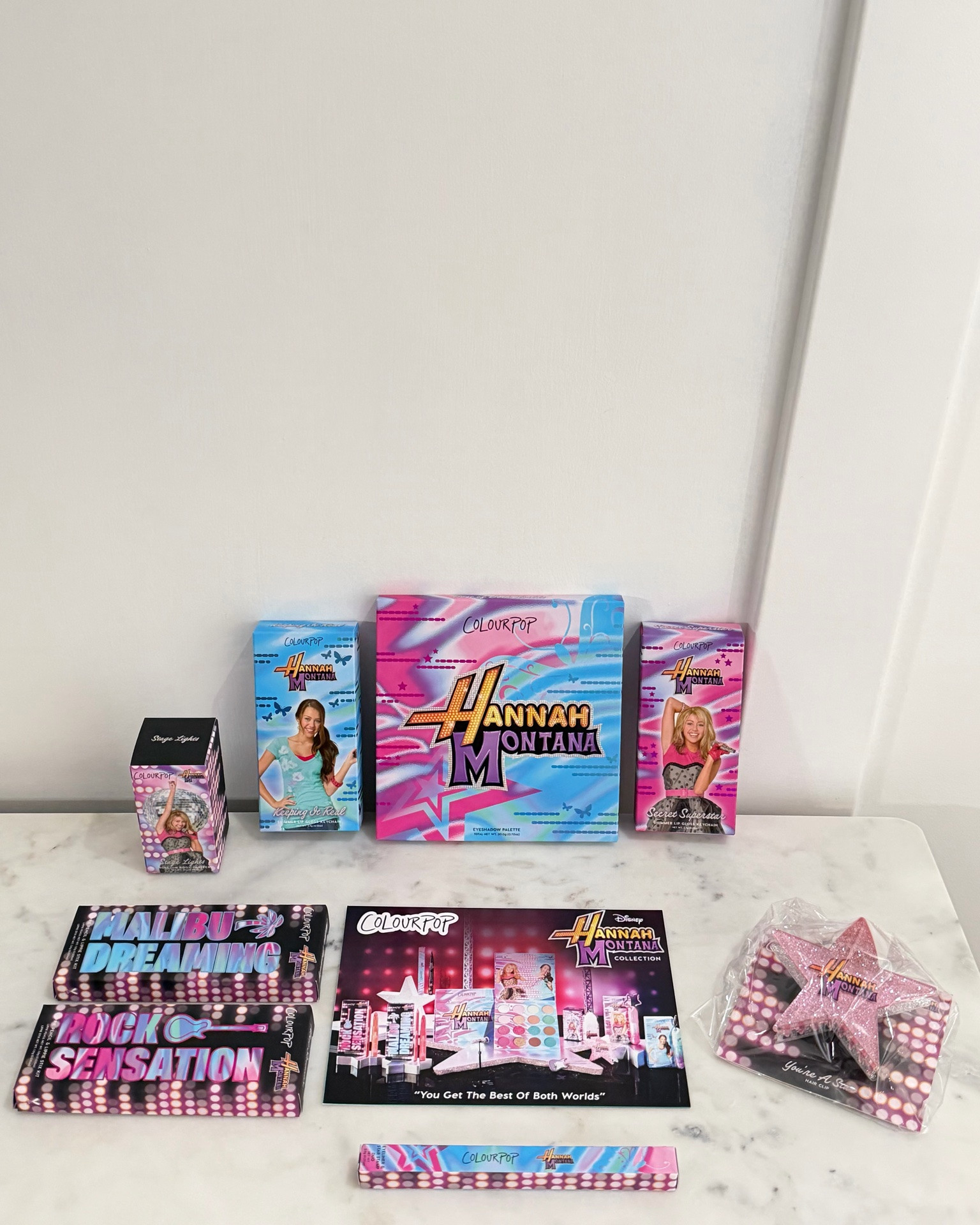 #ad #colourpop #cpparter #colourpophannahmontana Thank you so so much @colourpopcosmetics for sending me this!!!!💜🤗🥰 Say whaaaat? The ColourPop and Disney's Hannah Montana Collection celebrates the iconic pop star and 20th anniversary is happening!!⭐️🎤📀🎵🎀😍 Who’s never wanted the best of both worlds right?!😉 You now can have the best of both worlds!!!🙌🤩

This super fun collection has a variety of different shades that way you can live a double life!!👯🤫 You can keep it lowkey like Miley Stewart with soft neutrals!!🤎🦋🌻👢🤠 Or you can rock out the show like Hannah Montana with bright pops of colour!!💖🎤🌟🎸🤩
Which one do want to try first?🤔

🎤 🎶 Discover the #1 hits:
 🎨 Best of Both Worlds Eyeshadow Palette
🌟 Secret Superstar Lip Oil
💯 Keeping it Real Lip Oil
🎸 Rock Sensation Lippie Kit
🌴 Malibu Dreaming Lippie Kit 
💫 Eyeliner & Star Stamp Duo 🪩 Stage Lights Roll-on Body Glitter
⭐️ You're A Star Hair Clip

Coming to a stage near you on colourpop.com on June 25th at 10 AM PT 

Sign up now to be the first to KNOW when the collection is available!!💖

Save this post for updated link to shop! 🛍️☺️

#colourpopbesties

Makeup, eyeshadow, Colourpop, Colourpop lip combo, lip combo, eyeliner, lipgloss, gift ideas, teen gift idea, clean beauty, affordable makeup, affordable beauty, glam look, neutral makeup eyeshadow, Colourpop collection, new arrivals, new makeup, new launch, Colourpop launch, body glitter, keychain lip gloss

#LTKBeauty #LTKdayinmylife #LTKstorytime