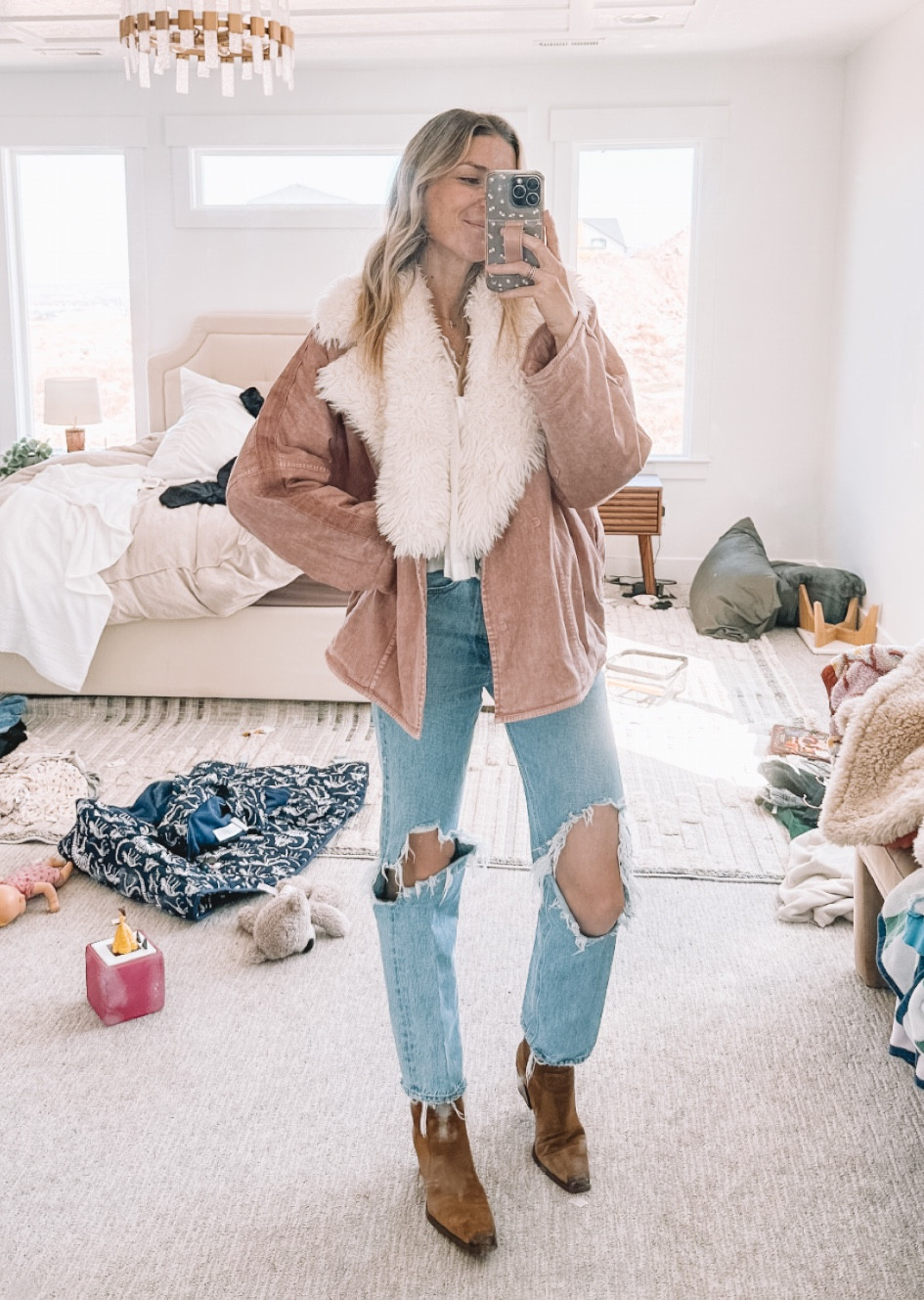 Top worn pair of jeans that so many of you have too (I went down 2 sizes) - comfy boots you see me wear all the time - I wear this jacket so much and the collar is removable - and you can’t see it but the shirt under here is so pretty and flowy and dainty and I just love it (comes in other colors too!)

#LTKsalealert #LTKSeasonal #LTKshoecrush