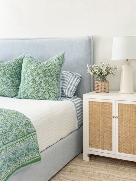 Loving this bedding combo for spring in our bedroom! I bought both the colorful quilt and striped sheets last year so they’re now on clearance! Also linking our light blue linen bed, rattan nightstands, ivory jute rug, faux baby’s breath and cane vase! I’ll include a look for less option for this bed and nightstand as well.
.
#ltkhome #ltkfindsunder50 #ltkfindsunder100 #ltkstyletip #ltkseasonal coastal decor, coastal decorating, amazing home, Serena & lily bed, 

#LTKSeasonal #LTKhome #LTKsalealert