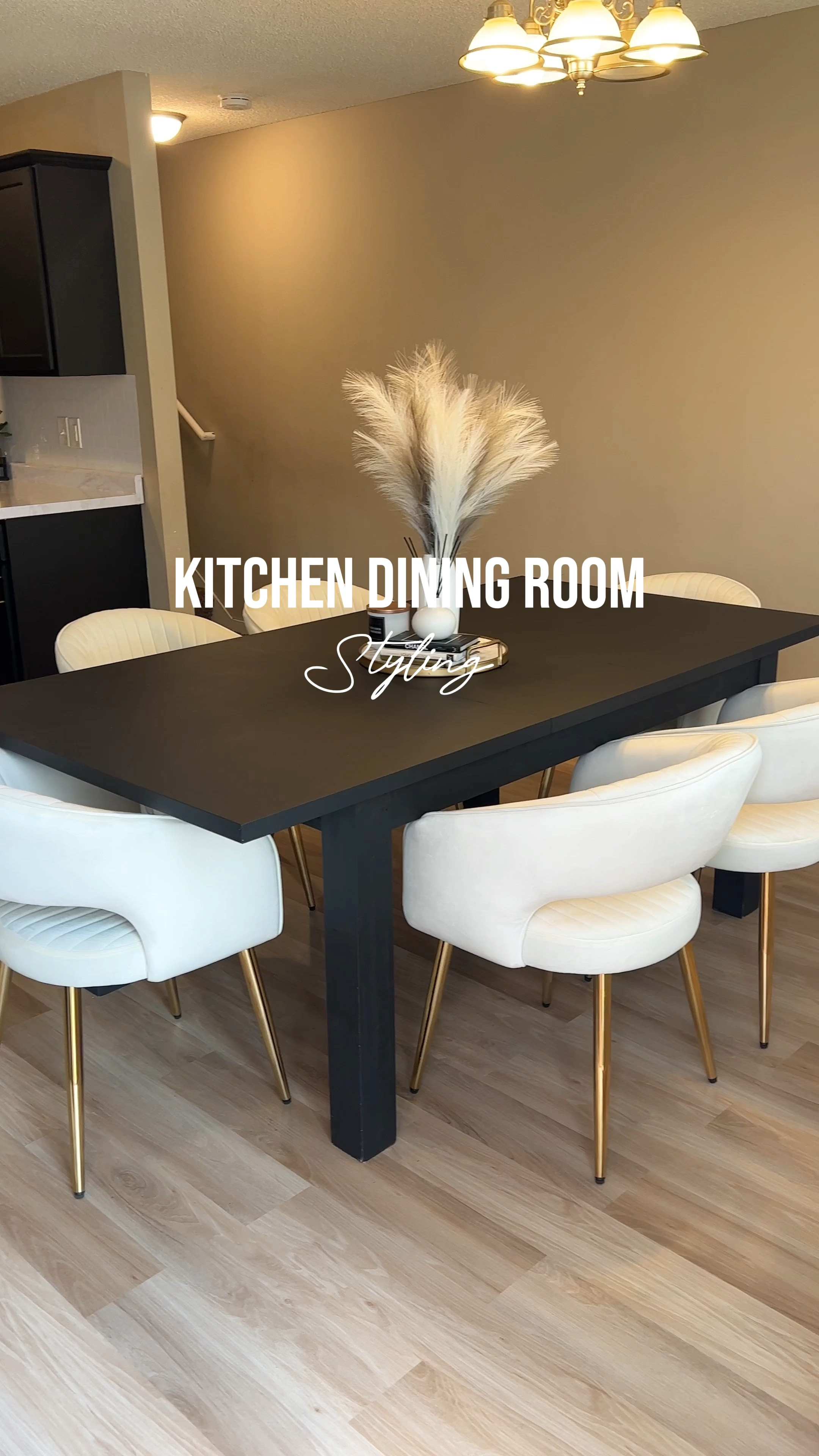We getting this kitchen /dining room together y’all! 🤎4.8 star reviews on these velvet dining chairs and they did not disappoint! Super sturdy and stylish.

-Vase, pampas grass, and marble gold tray from @worldmarket 
-candle from @target 
-fashion books on my amaz0n store front under decor
-table is from @wayfair shared on my LTK! It was gray at first and I painted with @behrpaint matte black. 

#kitchendiningroom #kitchentabledecor #diningroomdecor #diningtable #diningroomdesign #kitchenremodel #tablestyling #neutraldecor #neautralhome #shanicelashaystyle #home #diy #velvetchairs #diningchair #amazonfinds #amazonhome #worldmarket #targetfinds 

#LTKhome