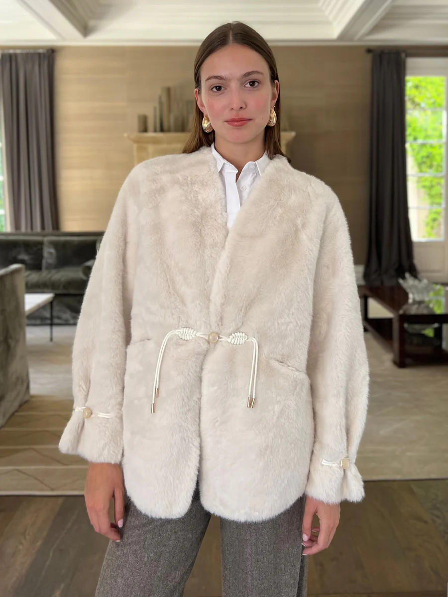 Clarisse Faux Fur Coat with Fishtail Braid Tie Detail - Cream | Benaar La