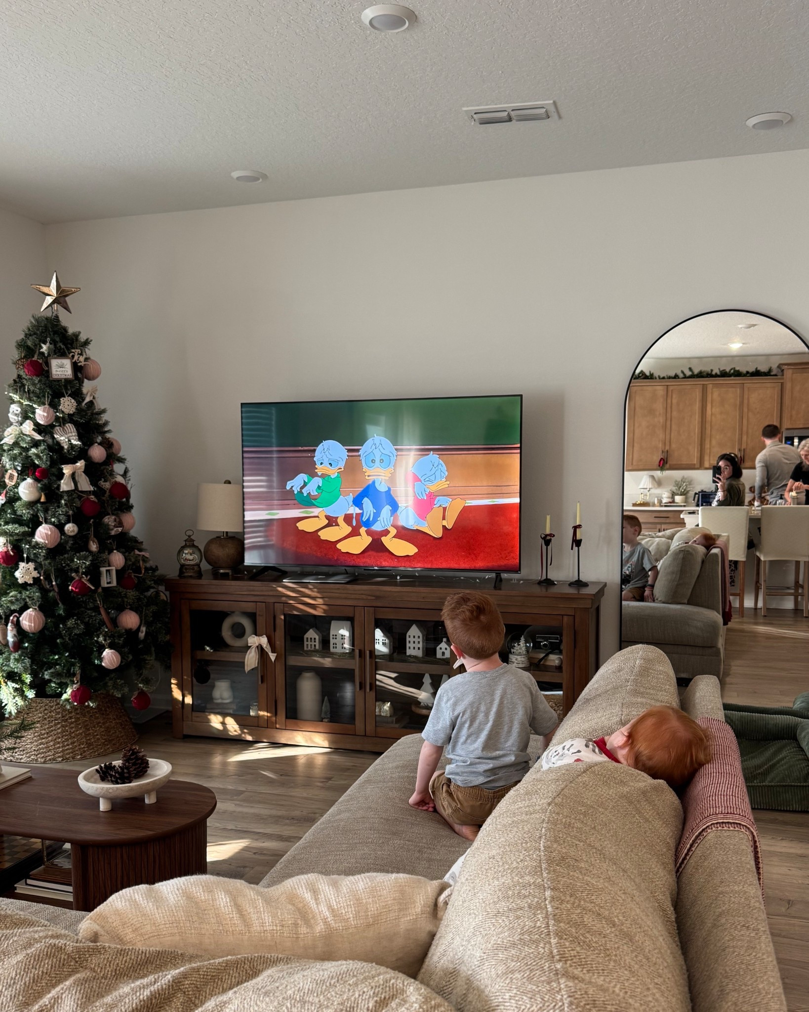 I get so many questions about our tv stand… it is unfortunately no longer available but here are some similar options if you like this style: 

#LTKHome