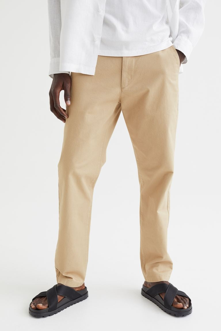 Conscious choice  Chinos in stretchy cotton twill. Zip fly, side pockets, and welt back pockets w... | H&M (US + CA)