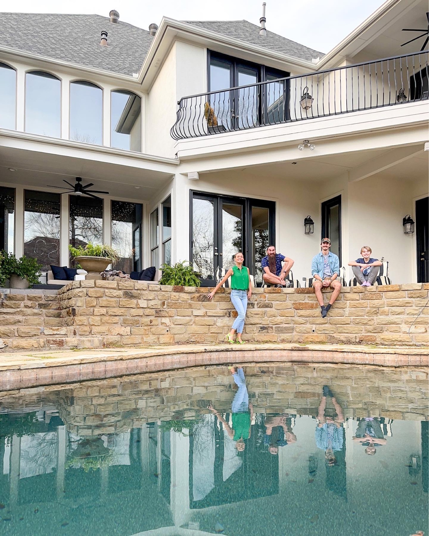 Relaxed poolside living with breezy ceiling fans and stripey beanbags🖤🤍

#LTKhome