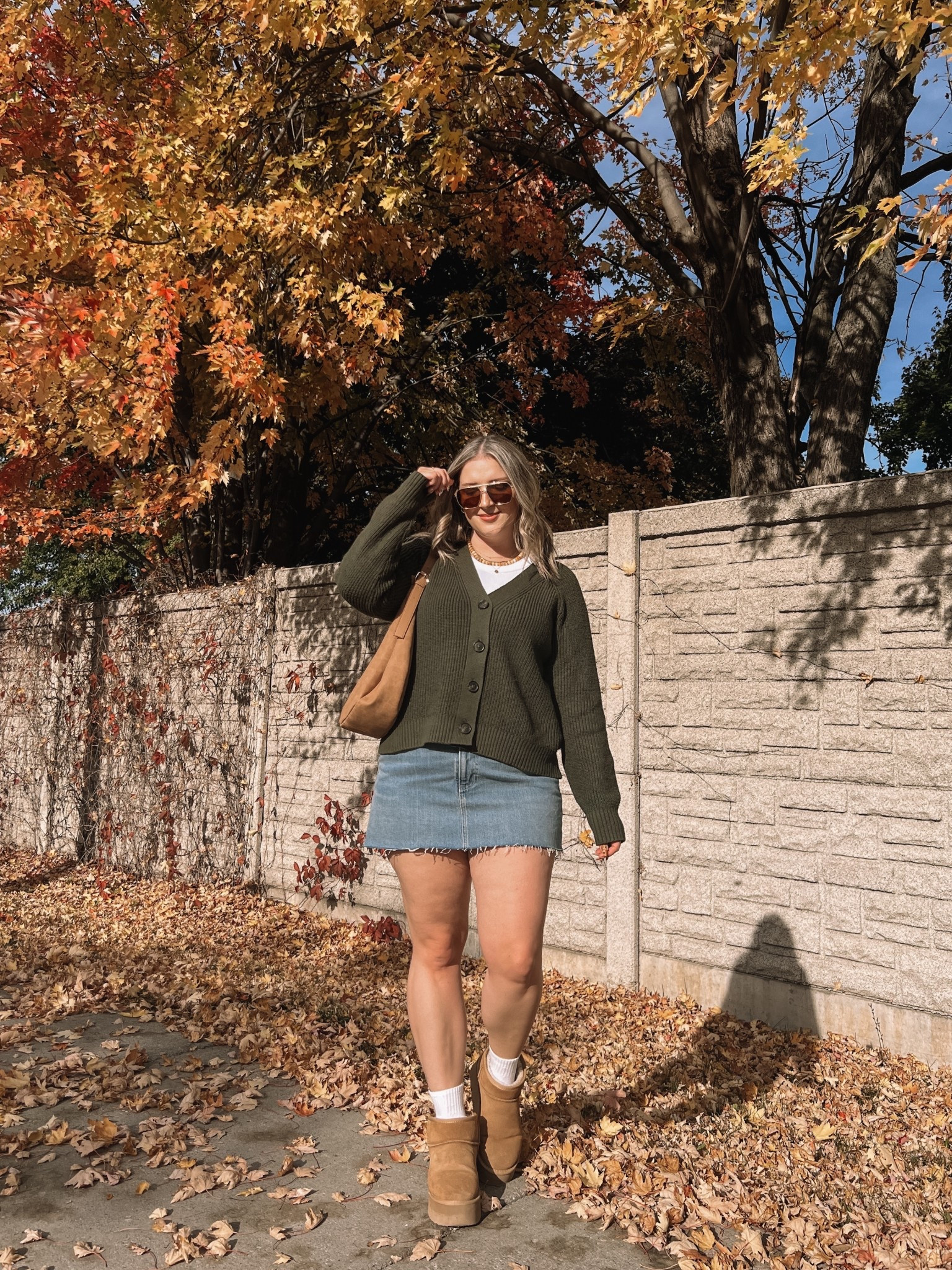 Casual fall outfit! Wearing 32 in the denim skirt (could have done 31 but I like a looser fit). Wearing my usual size L in the white tank. Linked similar olive green cardigans. My Ugg look for less boots are Amazon & such good quality! I’m usually a 9.5-10 and wear a 10.

#LTKmidsize #LTKstyletip #LTKfall