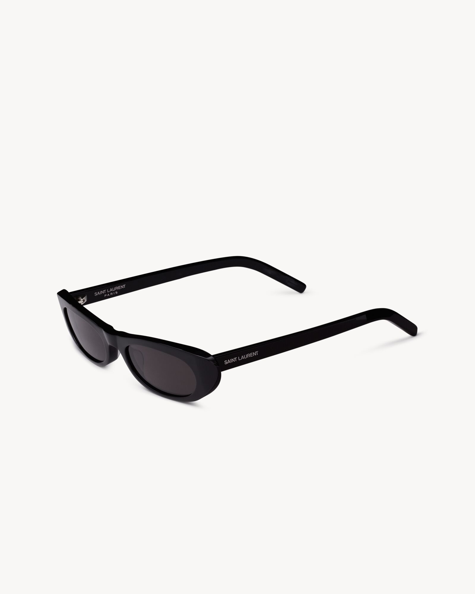 Sunglasses with narrow elongated cat-eye frames in acetate with nylon lenses. | Saint Laurent Inc. (Global)