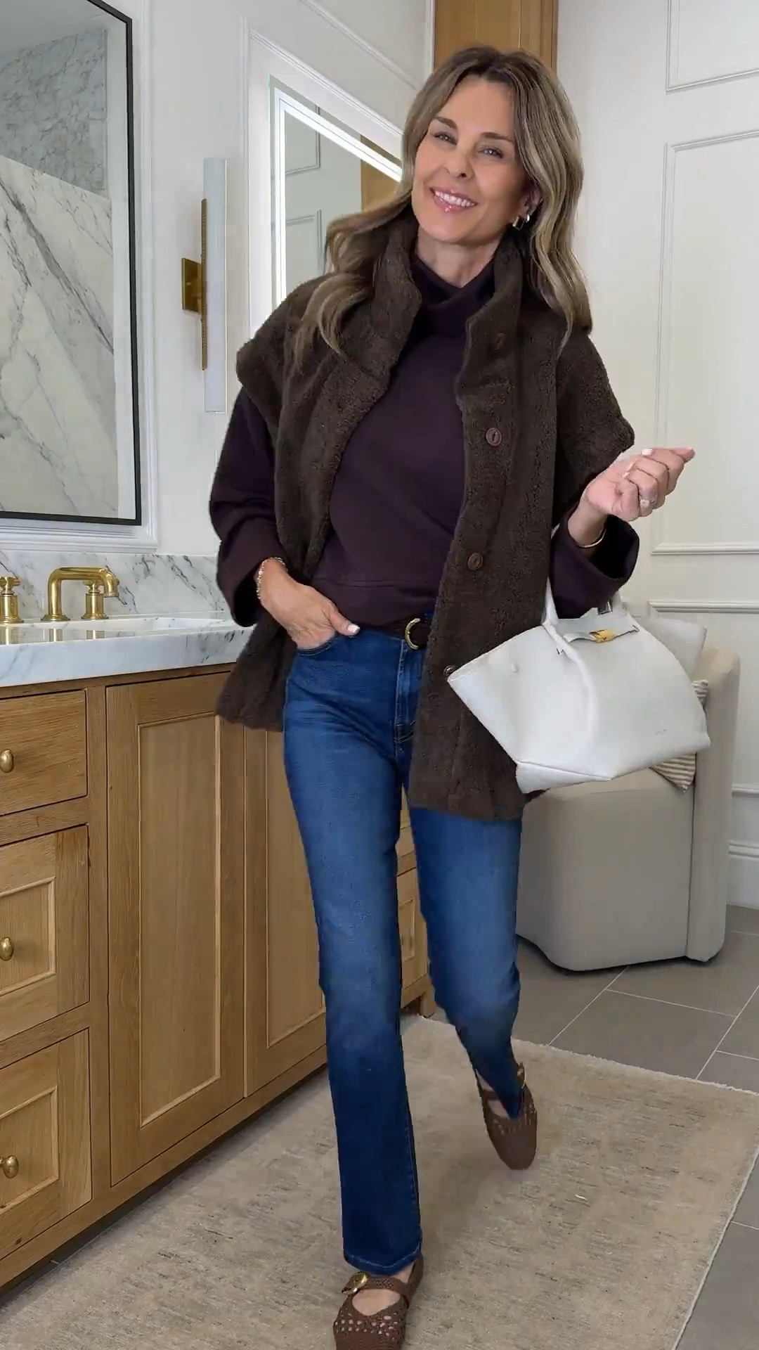 Casual everyday look. 
I’m  5’6”
-Spanx AirEssentials top sz Small. Code fashionedlifexspanx 
-Amazon Sherpa vest that is so good! 
-I linked the FP version too. FP is heavier with more details. Amazon is a cooler brown tone and lighter. 
-Jeans TTS 
-Ivory bag 

#LTKFindsUnder50 #LTKOver40
