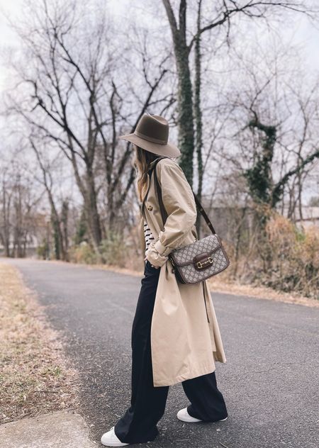Trench coat, spring outfit, Parisian style, striped sweater, wide leg pants, white sneakers, neutral wool hat, Gucci bag

#LTKitbag #LTKunder100 #LTKshoecrush