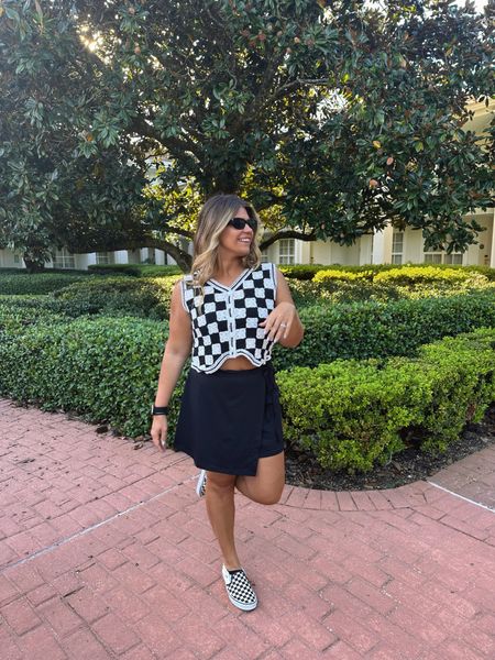 Vacation outfit 
Date night outfit 

All checkered everything 🖤
Sized up in the vest for length. Skirt runs TTS. This is my ideal skort: it can be dressed up or down and it is very soft/silky & almost feels like a swimsuit. Won’t show sweat either!

#LTKtravel #LTKHalloween #LTKshoecrush