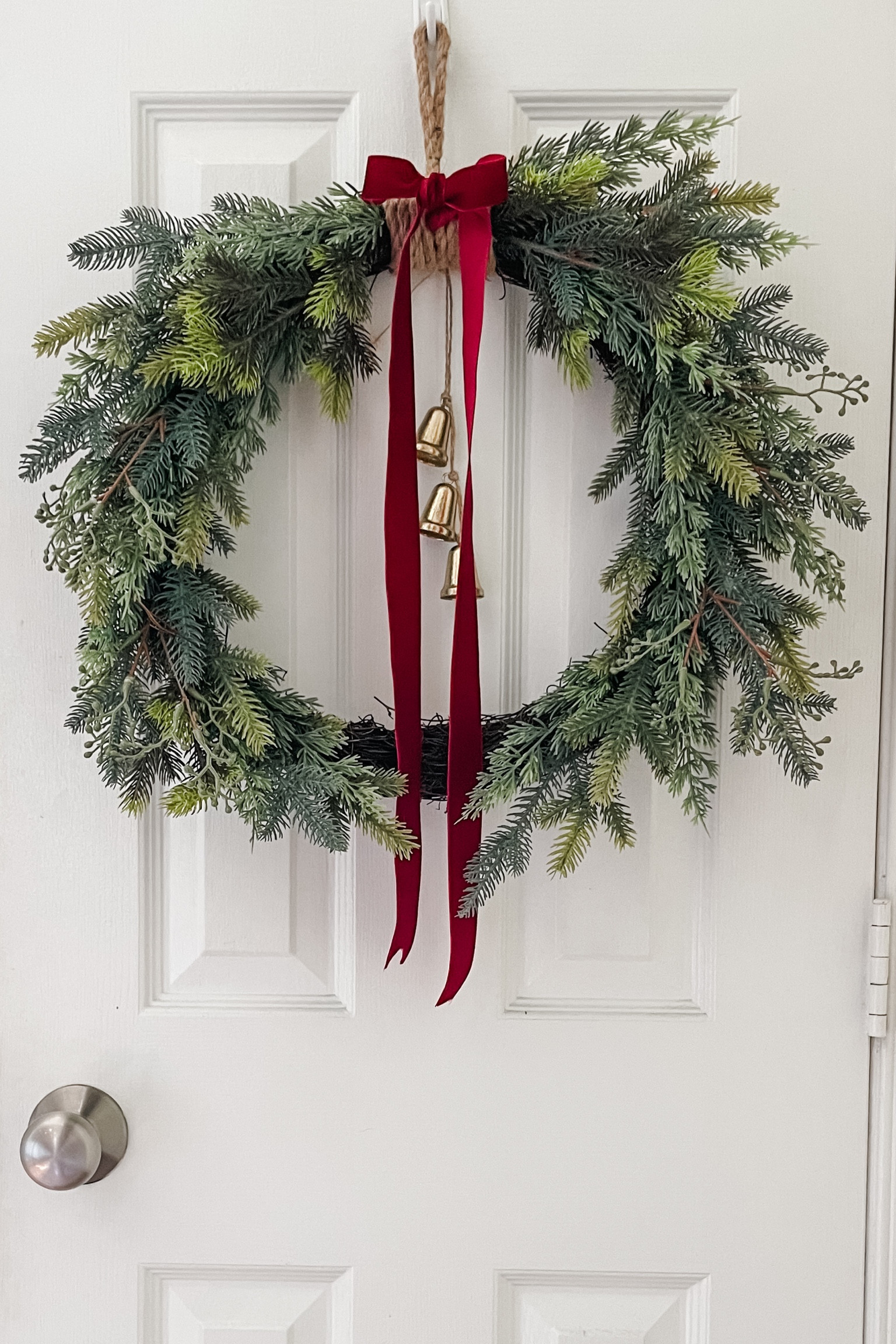 $20 Target Wreath 💚

Mixed Greenery Christmas Artificial Wreath

Elevate by adding ribbon and this $3 set of bells!

#LTKhome #LTKfindsunder50 #LTKHolidaySale