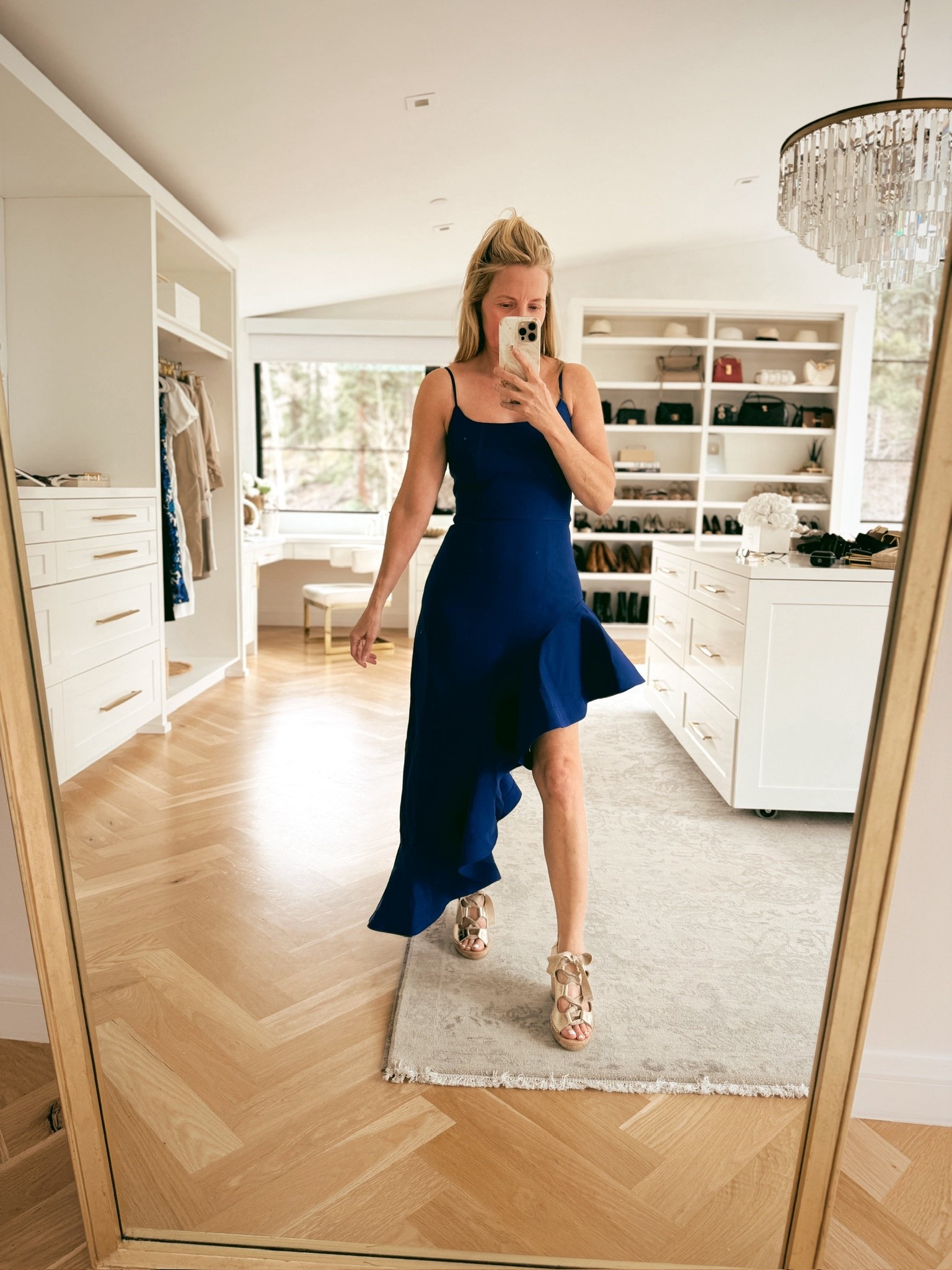 This asymmetrical dress from @Revolve  is a stunning piece — perfect for a summer wedding! The bold blue, the supportive fit, the dramatic asymmetrical ruffle hemline… it’s a standout for sure. 

#LTKOver40 #LTKWedding #LTKSeasonal