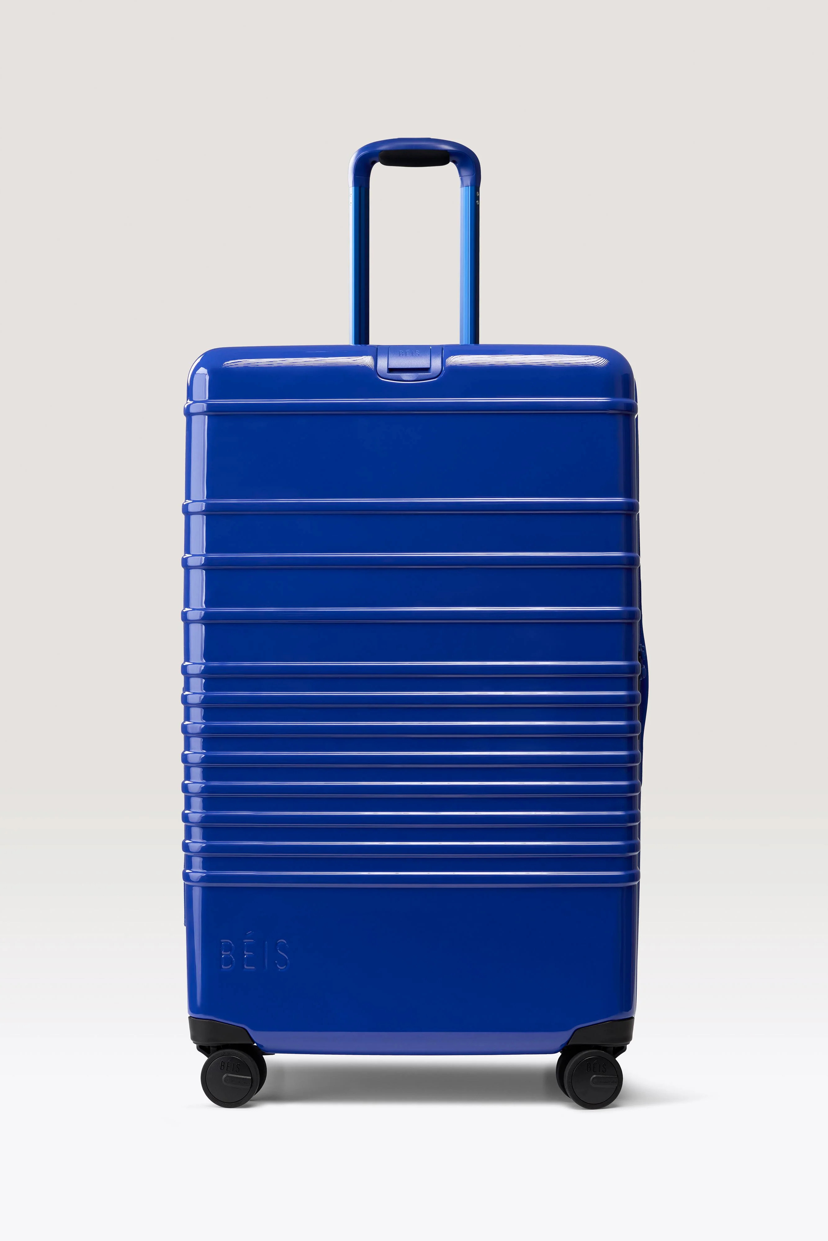 The Large Check-In Roller 
                in Glossy Cobalt Blue | BEIS