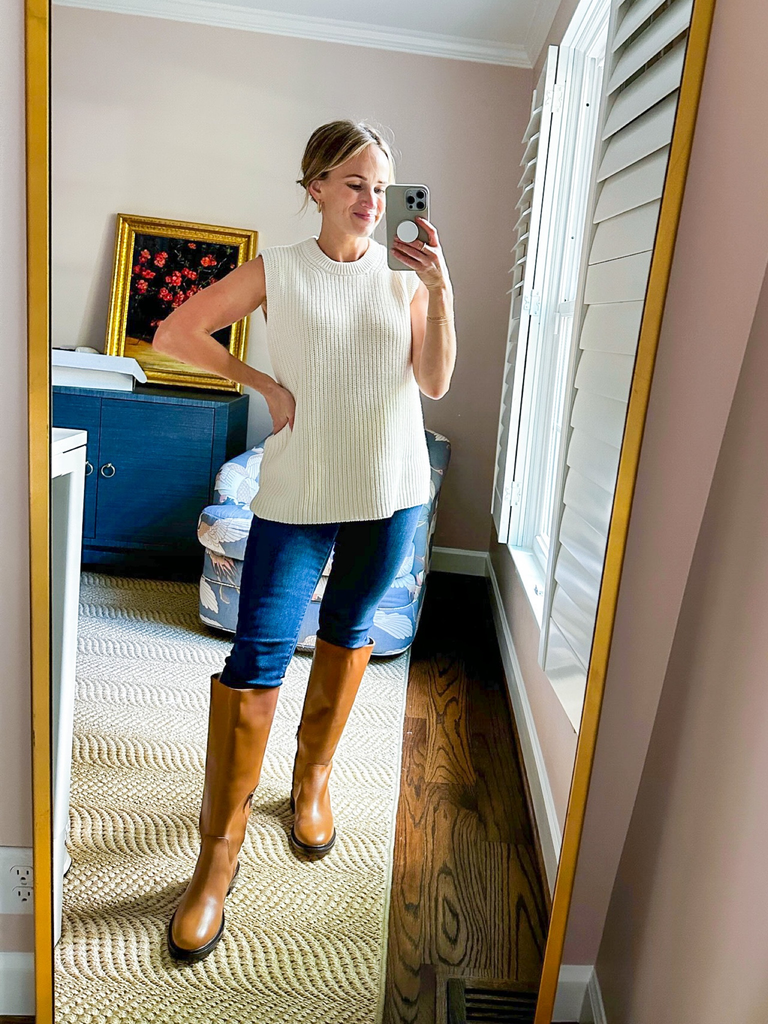 This sleeveless sweater from Madewell is SO flattering, not itchy at all, and works perfectly for a bump even though it’s not technically maternity. My maternity jeans are slightly too big (size down one size!), but the boots steal the show. These riding boots are SO comfortable, fit true to size, and have no distracting details. I love the versatile brown color and the tall shaft.  

#LTKbump #LTKshoecrush #LTKSeasonal