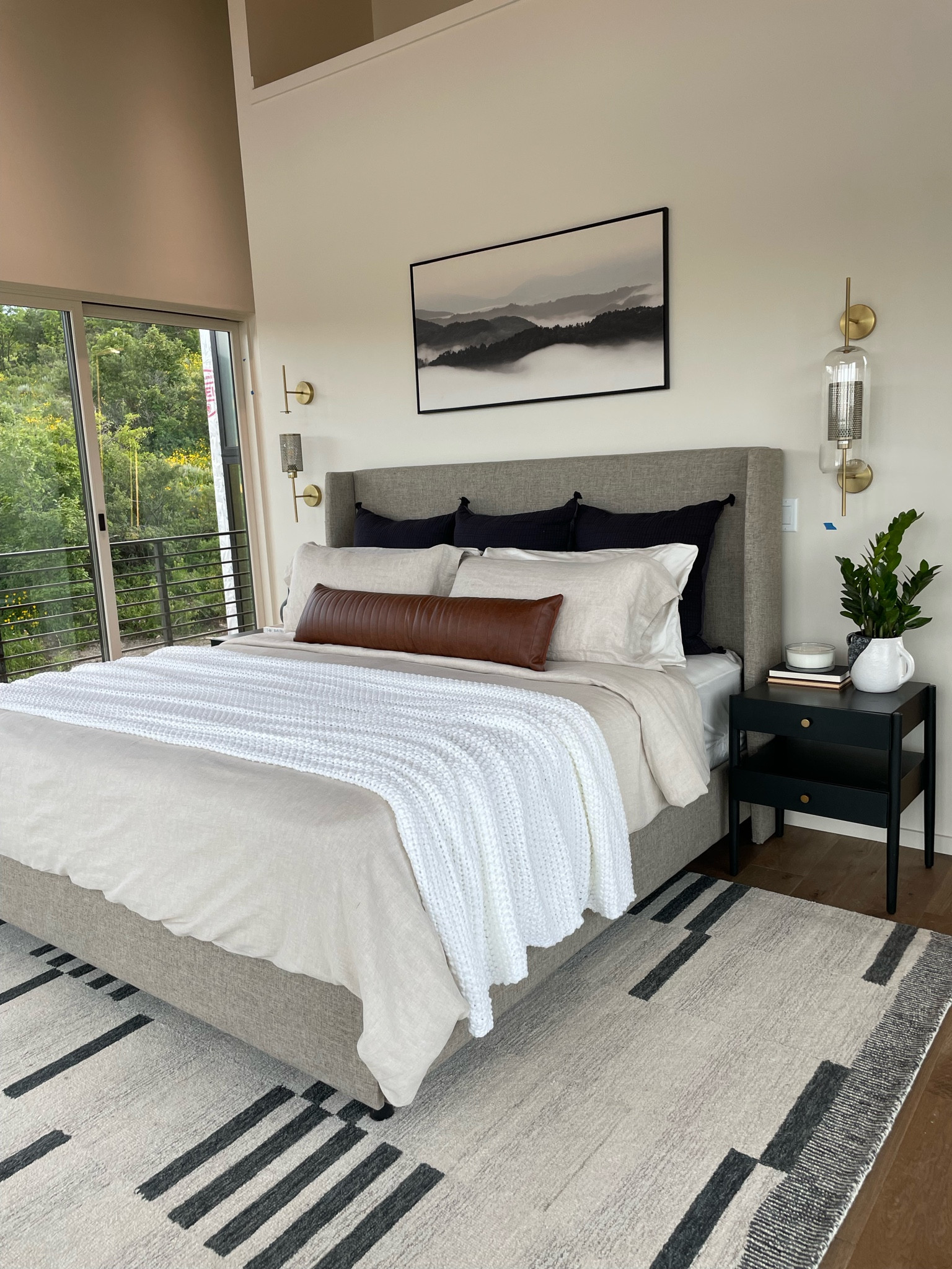 Primary bedroom✨ 

Upholstered king bed, platform bed, bedding, Casaluna, Shades of Light, rug, nightstands, sconce, lighting, art, home staging, decor 

#LTKstyletip #LTKhome #LTKFind