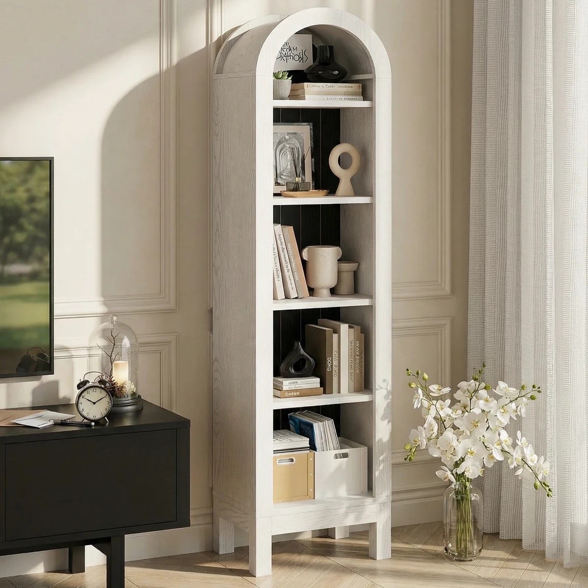 The 71.1”H x 13.78”W 5-Tier Arched Bookcase brings an elegant architectural detail to even the smallest spaces. Its graceful arched silhouette and five open tiers create a beautiful spot for displaying books, framed photographs, collectibles, and decorative accents while taking up minimal floor space. A lovely choice for a bedroom, living room, reading nook, or home office. ON SALE and under $150.

Ideas:

* elegant book storage
* small-space styling
* reading nook décor
* decorative bookshelf
* home office organization

Keywords:

* arched bookcase
* arched bookshelf
* narrow bookcase
* narrow bookshelf
* 5 tier bookshelf
* open bookshelf
* small space furniture
* decorative bookshelf
* living room bookshelf
* bedroom bookshelf
* home office bookshelf
* display shelving
* home library décor
* modern home décor
* elegant home décor

#LTKHome #LTKSaleAlert #LTKSeasonal