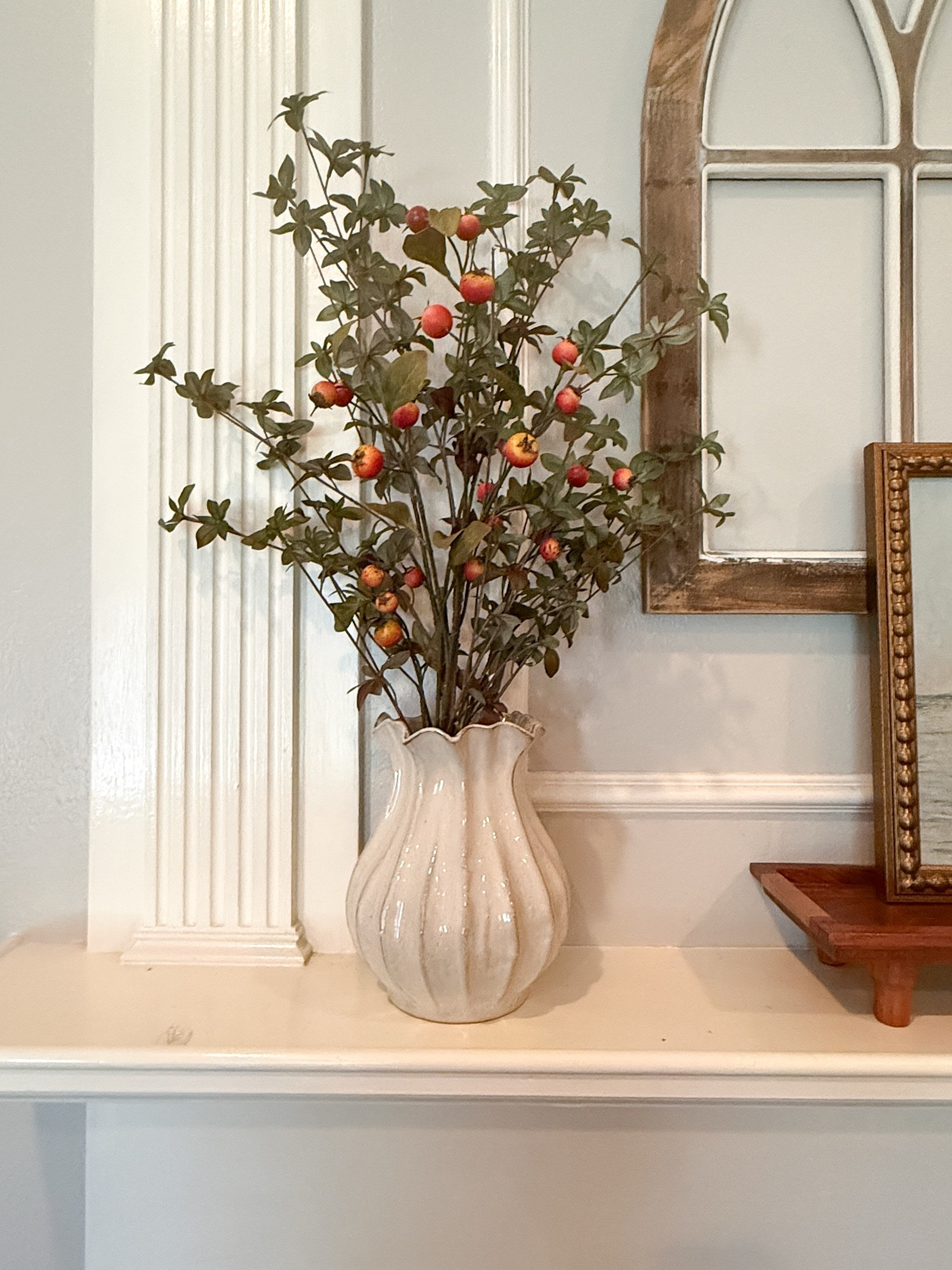 I love adding fall touches with faux florals that look realistic. This neutral vase with fall florals makes a beautiful statement on the mantle.

#LTKHome