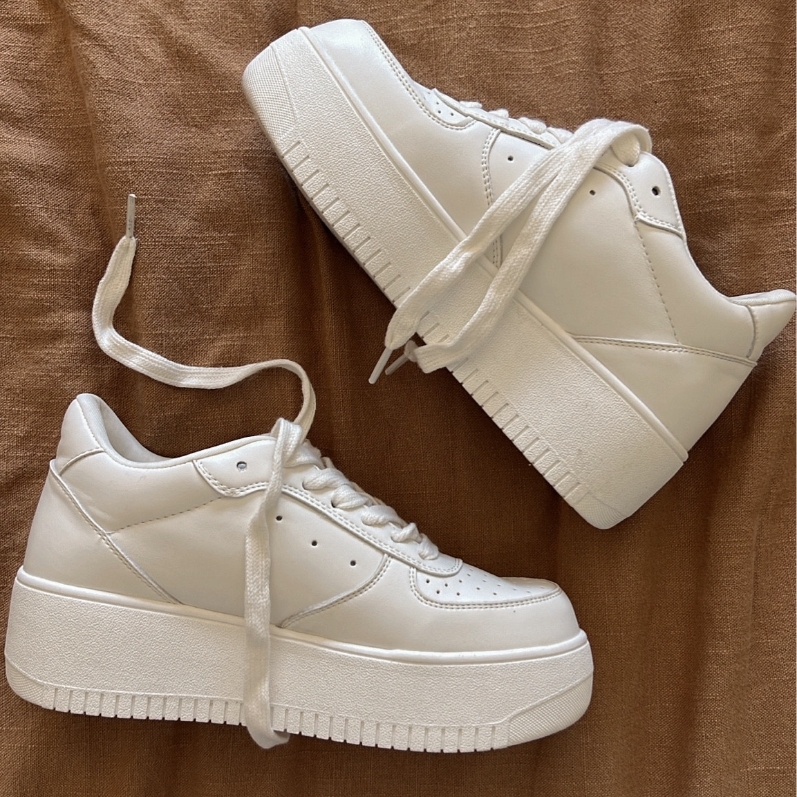 These platform sneakers are my new favorite! The cushion and weightless feel make them so comfortable! 

Fit TTS with a light sock, but I recommend sizing up if you prefer a thicker sock. 

#platformsneaker #whiteshoes #springstyle #springsale  

#LTKsalealert #LTKshoecrush #LTKSeasonal