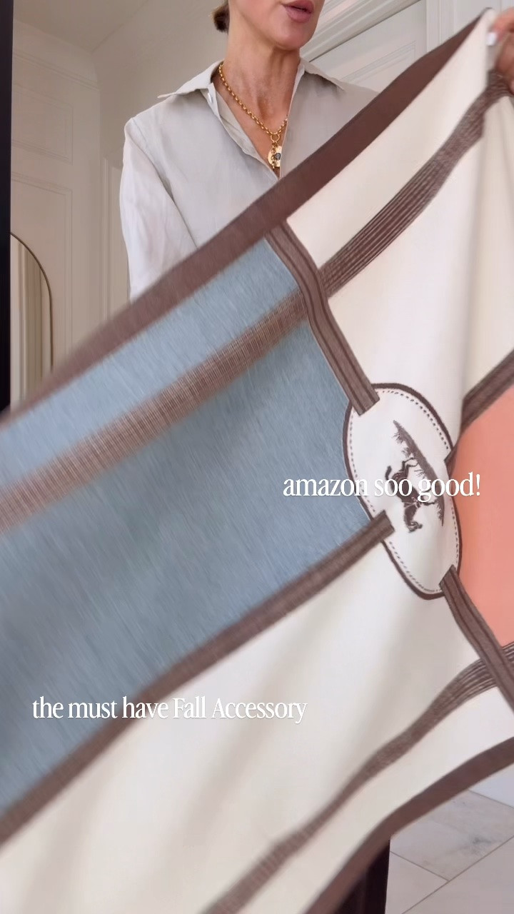 I'm obsessed with this Amazon scarf. It's giving Designer vibes and it is a fall it accessory.