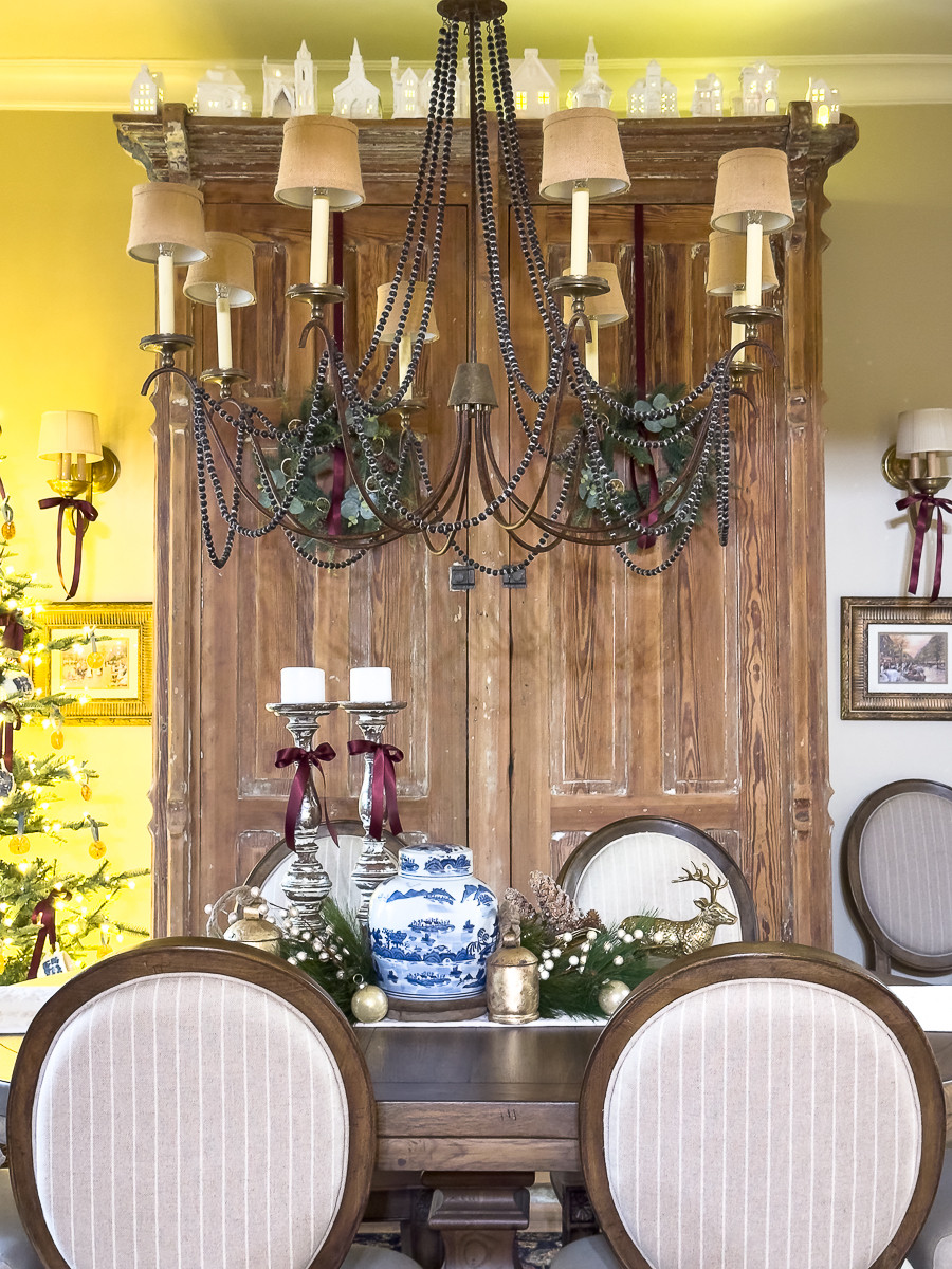 Classic Christmas dining room with a 7-foot accent tree from King of Christmas. Loving the burgundy and soft blue velvet ribbon.  

 #LTKHoliday #LTKHome #LTKSaleAlert