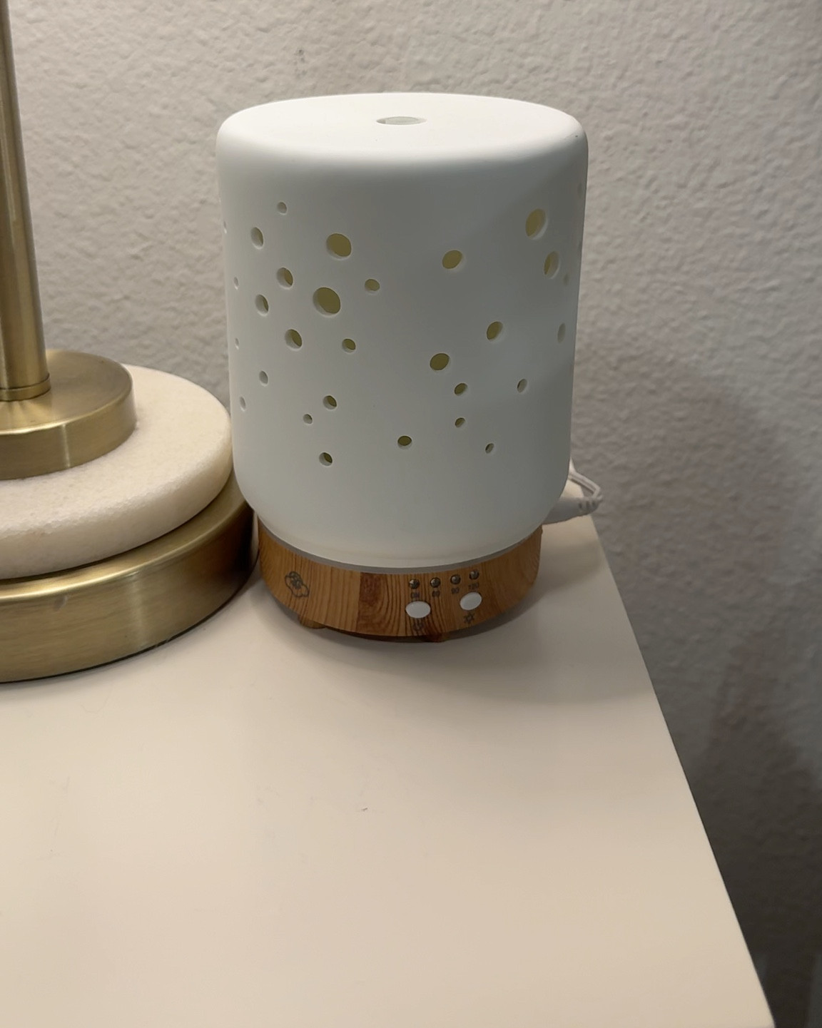 In-store find originally, but this is the closest match I could find online 🤍 Same soft glow, fixed color option, multiple rotating light settings, and long run time. Gives the same cozy, elevated vibe without overpowering the space.

#LTKFindsUnder50 #LTKHome