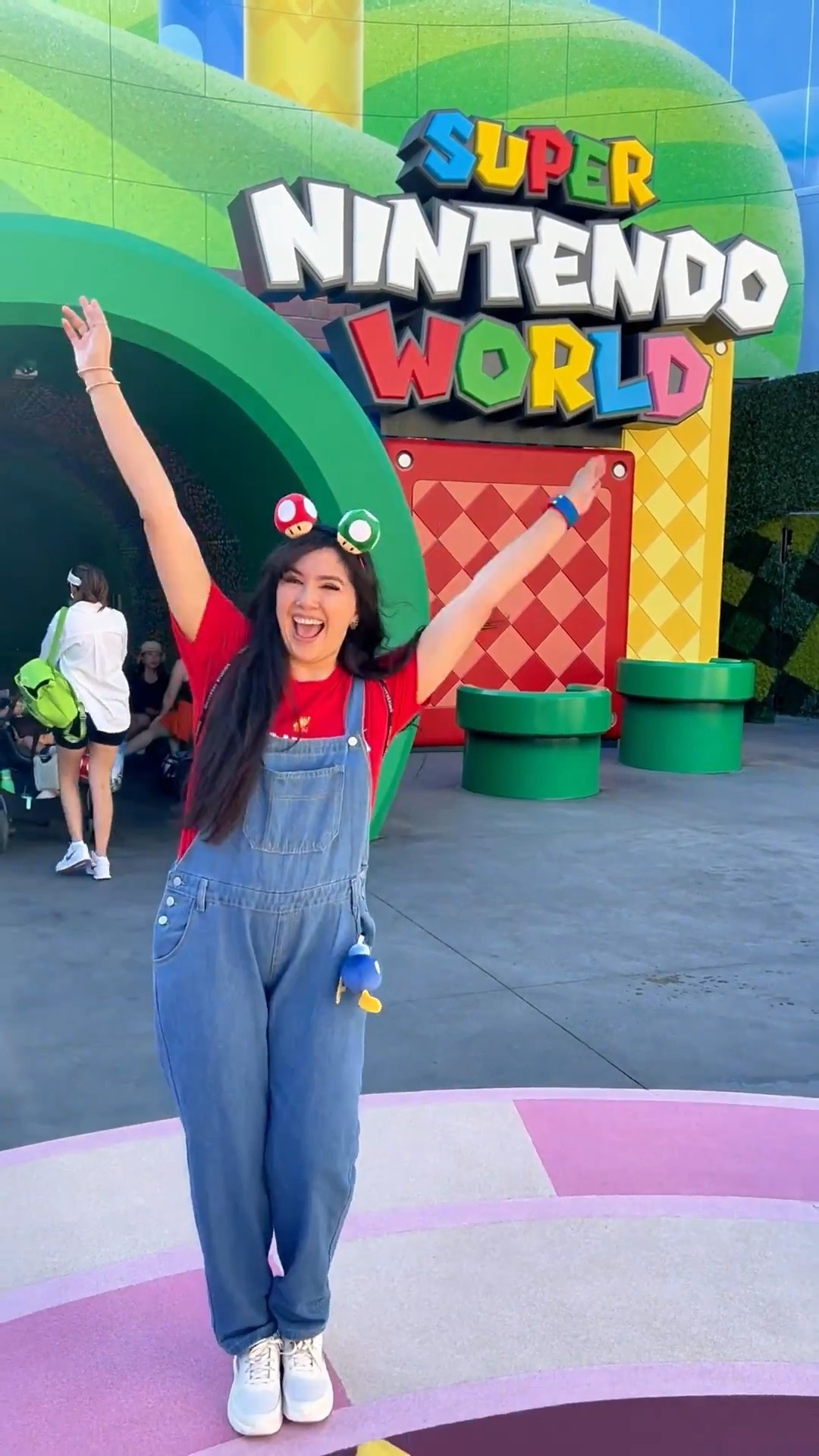 🤗Power up your theme park style with this super Mario inspired fandom fashion outfit! 🌎 I wore this outfit during my visit to Super Nintendo World at Universal Studios Hollywood and had the best time stepping straight into the world of Super Mario 🎮⭐️

🎟️ From the Toad headband to my player one tee, classic blue overalls, comfy sneakers, and all the cutest plushies like Yoshi, Mario, and even a little bomb keychain—this outfit was made for a day of exploring!

✨ What I love most is how easy these pieces are to style for any theme park trip—fun, comfy, and full of character. ❤️Whether you’re racing through Mario Kart: Bowser’s Challenge or grabbing themed snacks, this look is perfect for showing off your fandom while staying park-ready. 🏎️

Tap to shop everything I wore (plus a few extra theme park essentials you’ll need for a hot summer day at Universal!)

Universal theme parks outfit inspo, Angie’s magical Style, theme park travel essentials 

#LTKStyleTip