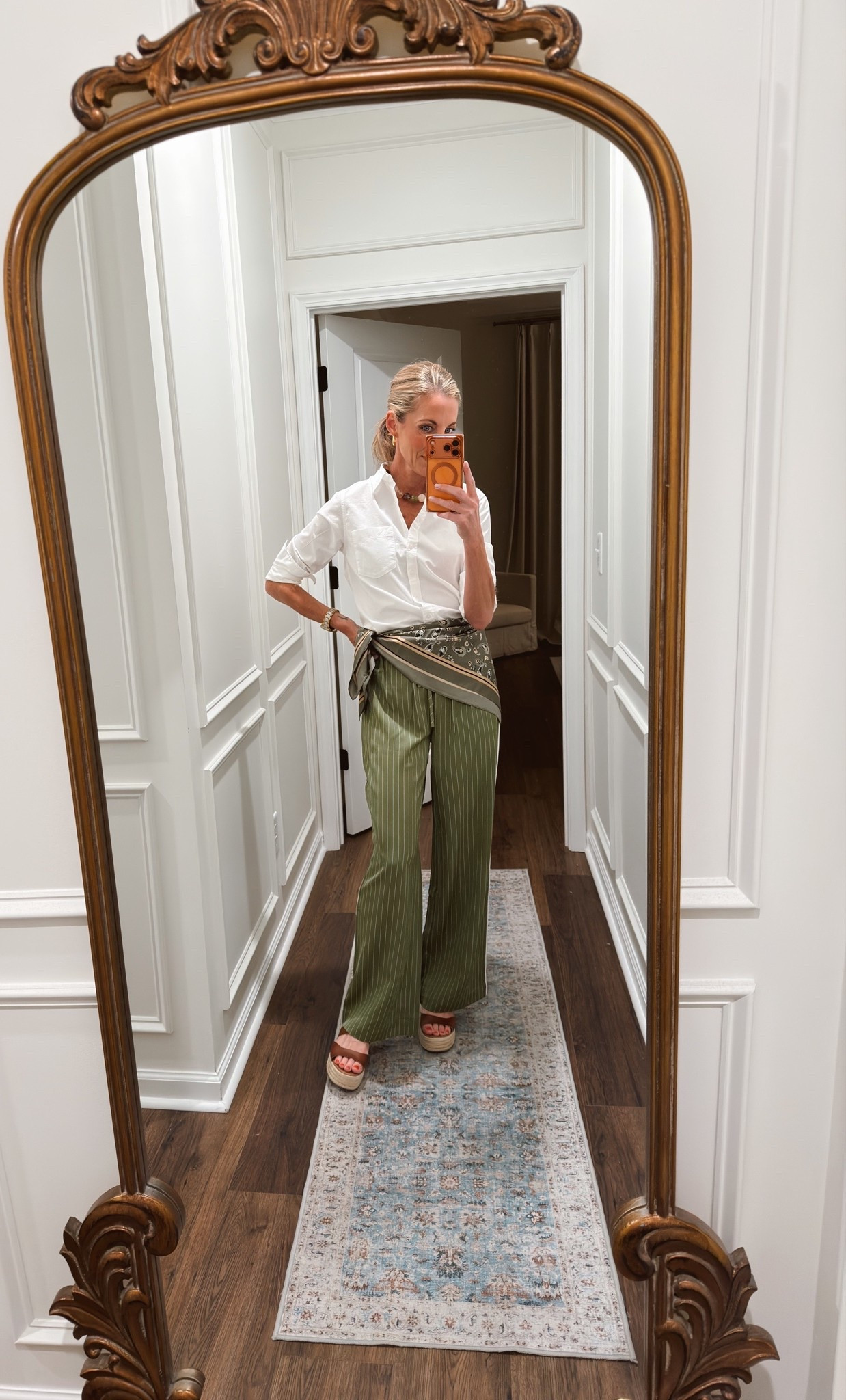 Today’s outfit of the day is from loft! I love these trending track pants and scarf detailing!!! I added a crisp white shirt and my bubble bar jewelry. Everything is a size extra small.