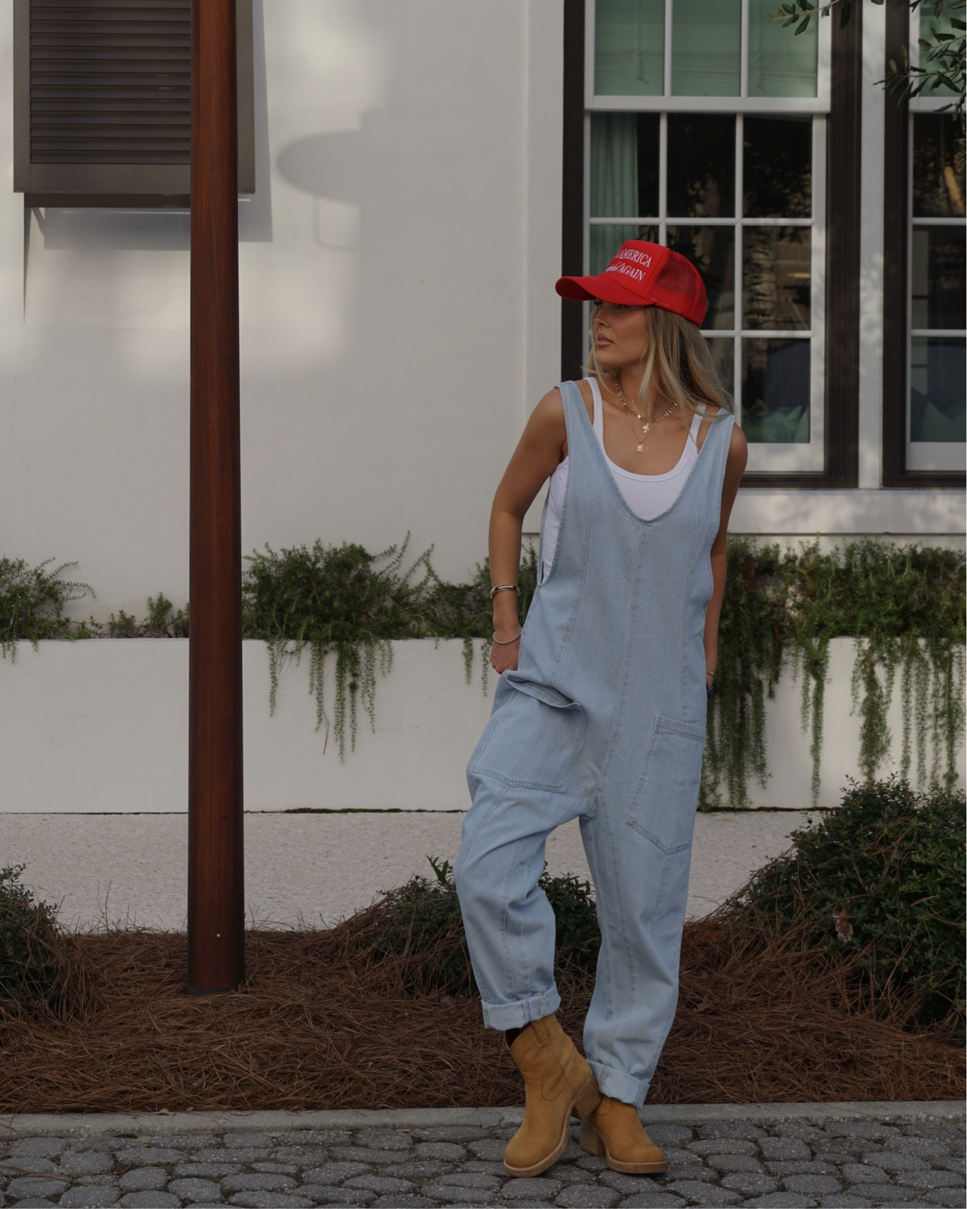 Big overall girl lately 🤝 Wearing a small in the jumpsuit & tank. I’m 5’6 for reference. 

Trucker hat is temporarylocal.co ❤️

Western style, cowboy boots, overalls, jumpsuit, denim outfit, casual style, free people, look for less 

#LTKFindsUnder50 #LTKFindsUnder100 #LTKStyleTip