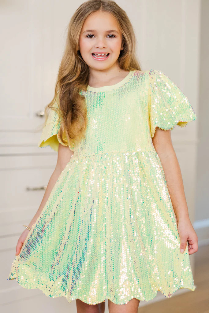 Girls: Add a Little Shine Yellow Sequin Babydoll Dress | The Mint Julep Boutique