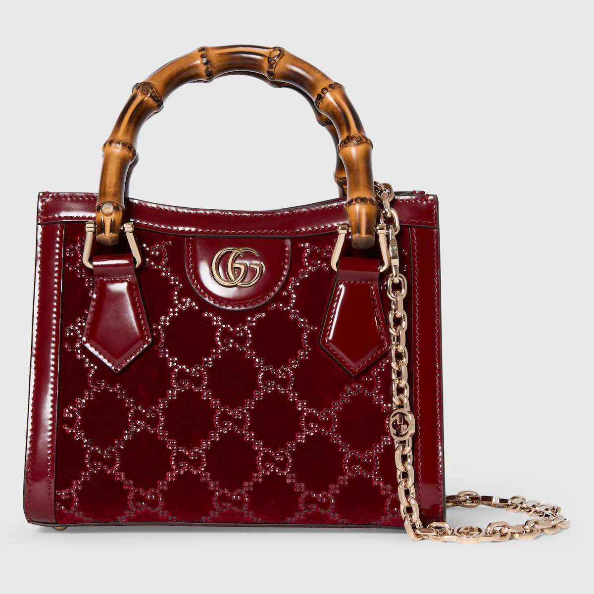 This Gucci Diana, one of the House's signature collections, is crafted in velvet and GG crystal m... | Gucci (US)