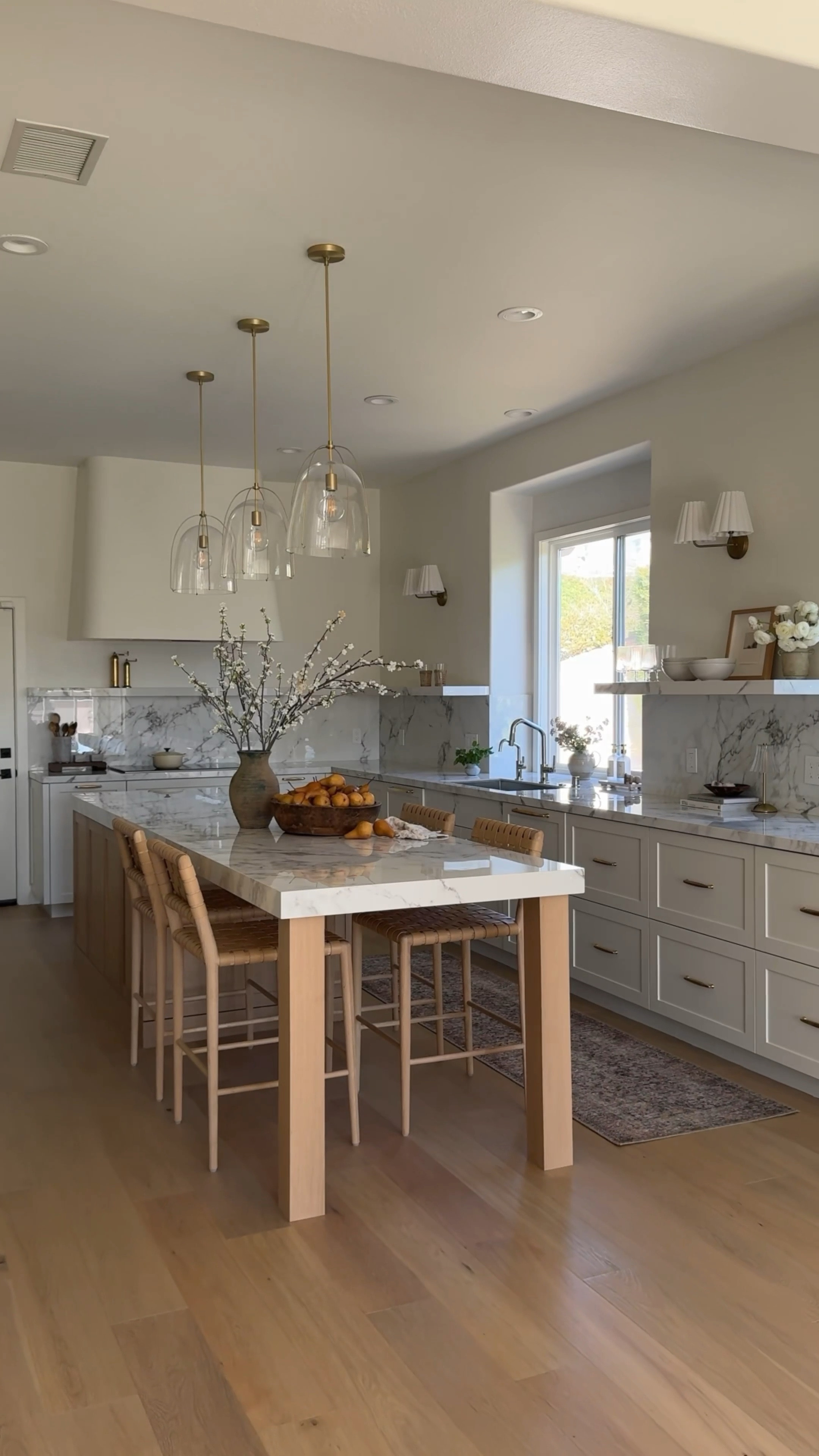 Rejuvenation brass Hardware, brass pole on lacquered, brass, glass pendant, vase, vintage vase, faux greenery, flowers, brass, Peppermill target, a floral, brown vase, fake flowers vintage runner leather counter stool Loloi rug amber interiors dish plate scallop vintage rug shop