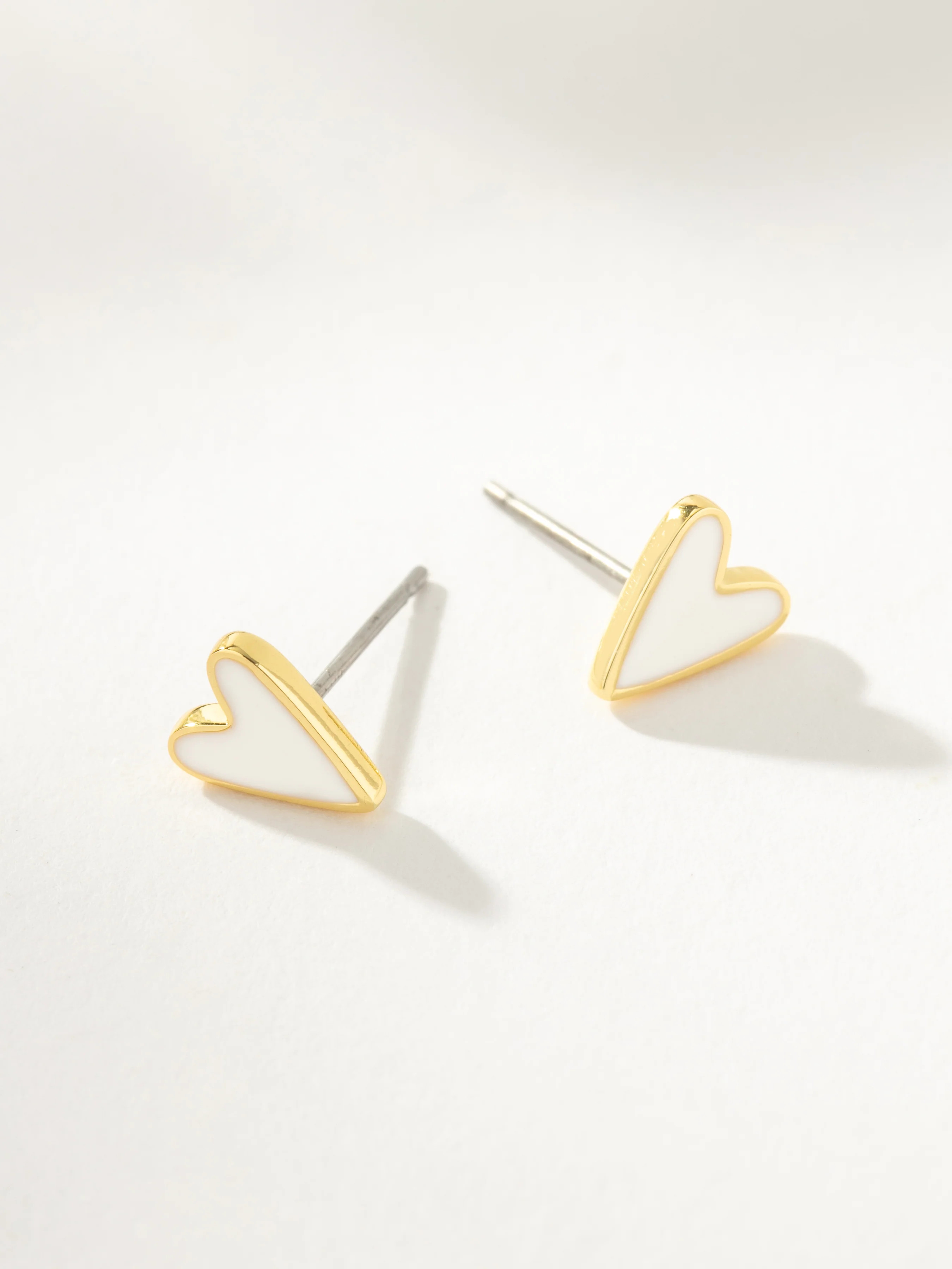 White Enamel Heart Stud Earrings in Gold | Uncommon James | Uncommon James