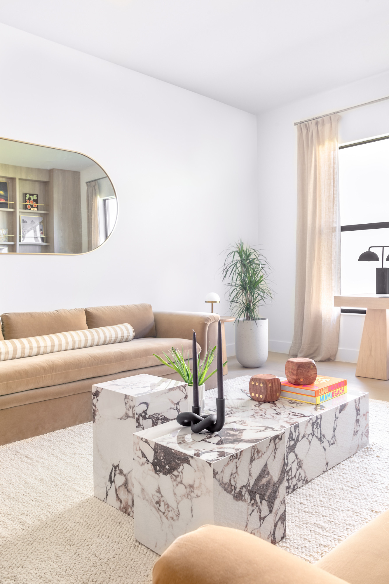 The next room from the entryway is what we’re calling the library—a space that was originally designed to be a formal living room but is being reimagined for modern family needs. More and more, families are choosing to transform this traditionally underutilized space into something more practical. Our client asked for a flexible area where they could work, lounge, or entertain, and we’re thrilled with how it turned out.  

 #LTKHome