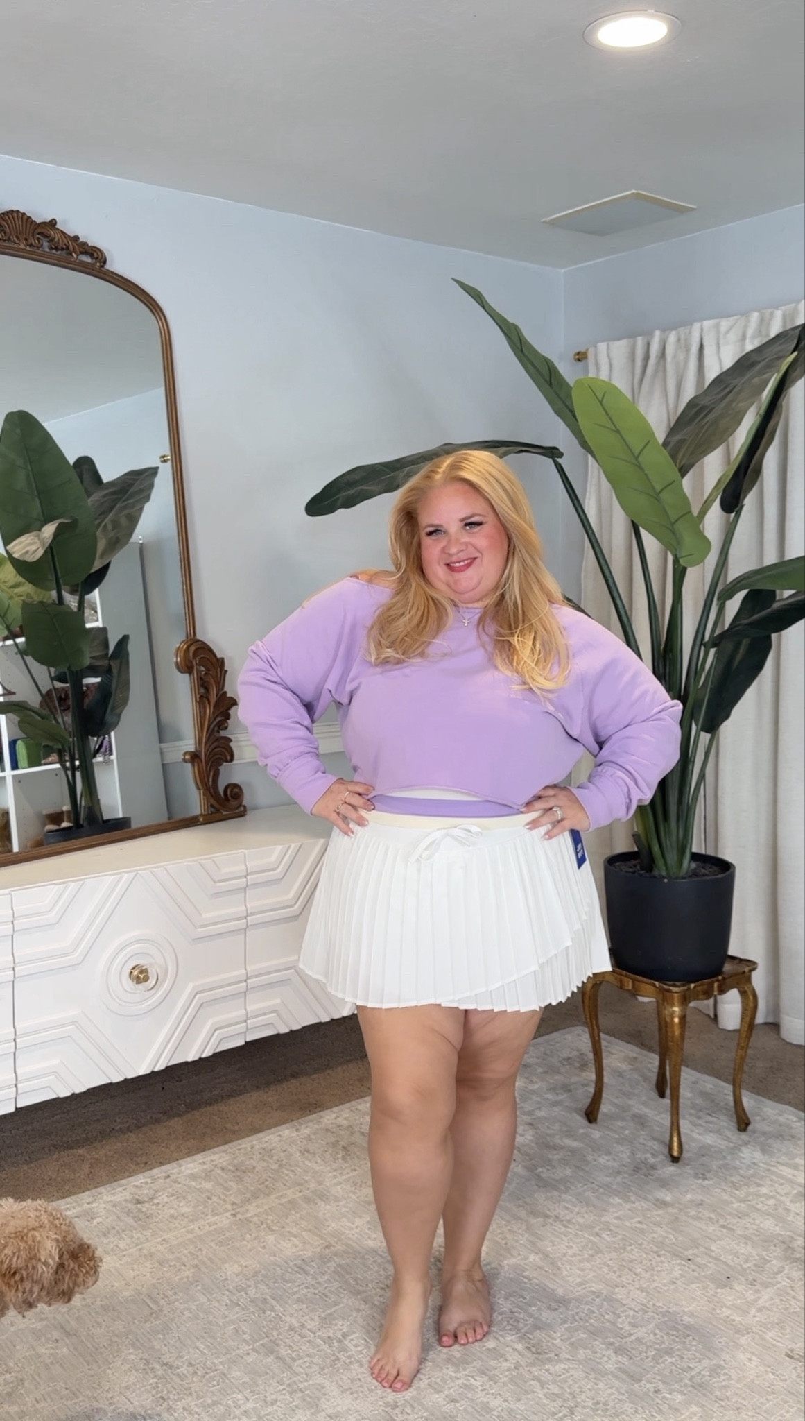 Soft girl meets sporty 💜

This lavender cropped sweatshirt is that perfect in-between length. It shows just a touch of waist without feeling exposed and balances the volume of the pleated skirt so you still get shape.

The skirt has built-in shorts and actually floats away from the tummy instead of clinging. Easy, comfortable, and gives that effortless tennis vibe without trying too hard.

Both pieces are linked in my LTK with sizing details.

#LTKPlusSize #LTKOver40 #LTKActive