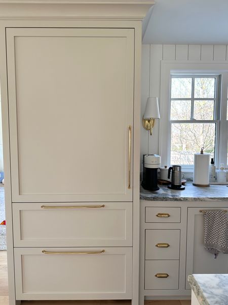 I used the 18” Massey appliance pull in unlacquered brass on our paneled refrigerator to seamlessly blend into the rest of the kitchen cabinetry. I love the look and they feel strong enough to open the door easily despit the strong suction of the Subzero. Highly recommend!



#LTKsalealert #LTKstyletip #LTKhome