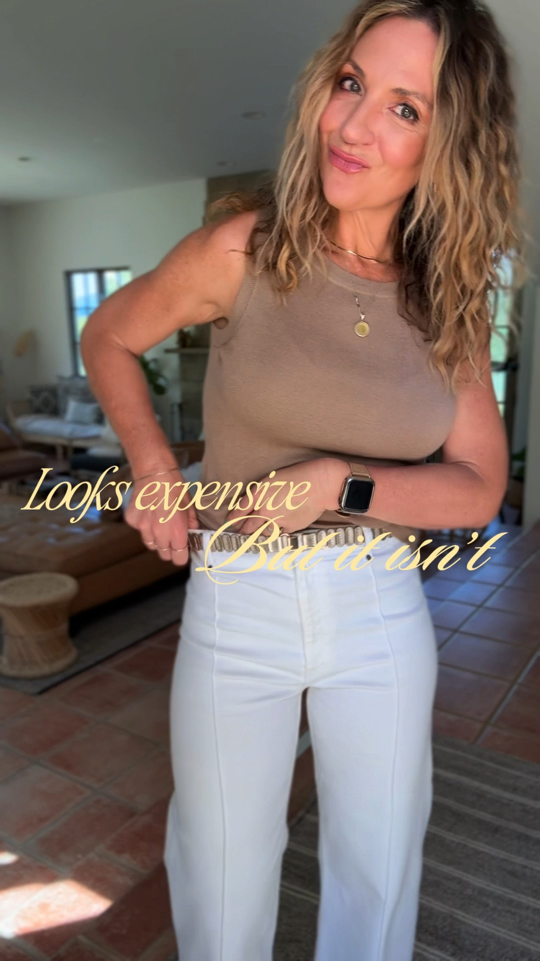 Spring outfit idea | elevated basics 🤍

This tank is one of those quiet luxury pieces that instantly makes an outfit feel more polished. It’s incredibly soft (feels like cashmere), lightweight, and breathable—plus it’s under $25 which still surprises me.

Wearing a size small for reference (I’m 5’7”, usually a small in tops / medium bottoms). It’s long enough to wear tucked or untucked and lays really nicely without clinging.

Styled it here with wide leg white denim trousers, a gold stretchy belt, and neutral sandals for an easy, elevated look that works for so many occasions.

Perfect for spring outfits, teacher outfits, work outfits, or even a simple going out outfit when you want something effortless but put together.

Such a good staple if you’re building a neutral, elevated wardrobe 🤍

Linked here

#springoutfit #teacheroutfit #workoutfit #elevatedbasics #quietluxury #neutralstyle #momstyle #LTKunder50

#LTKootd #LTKWorkwear #LTKgrwm