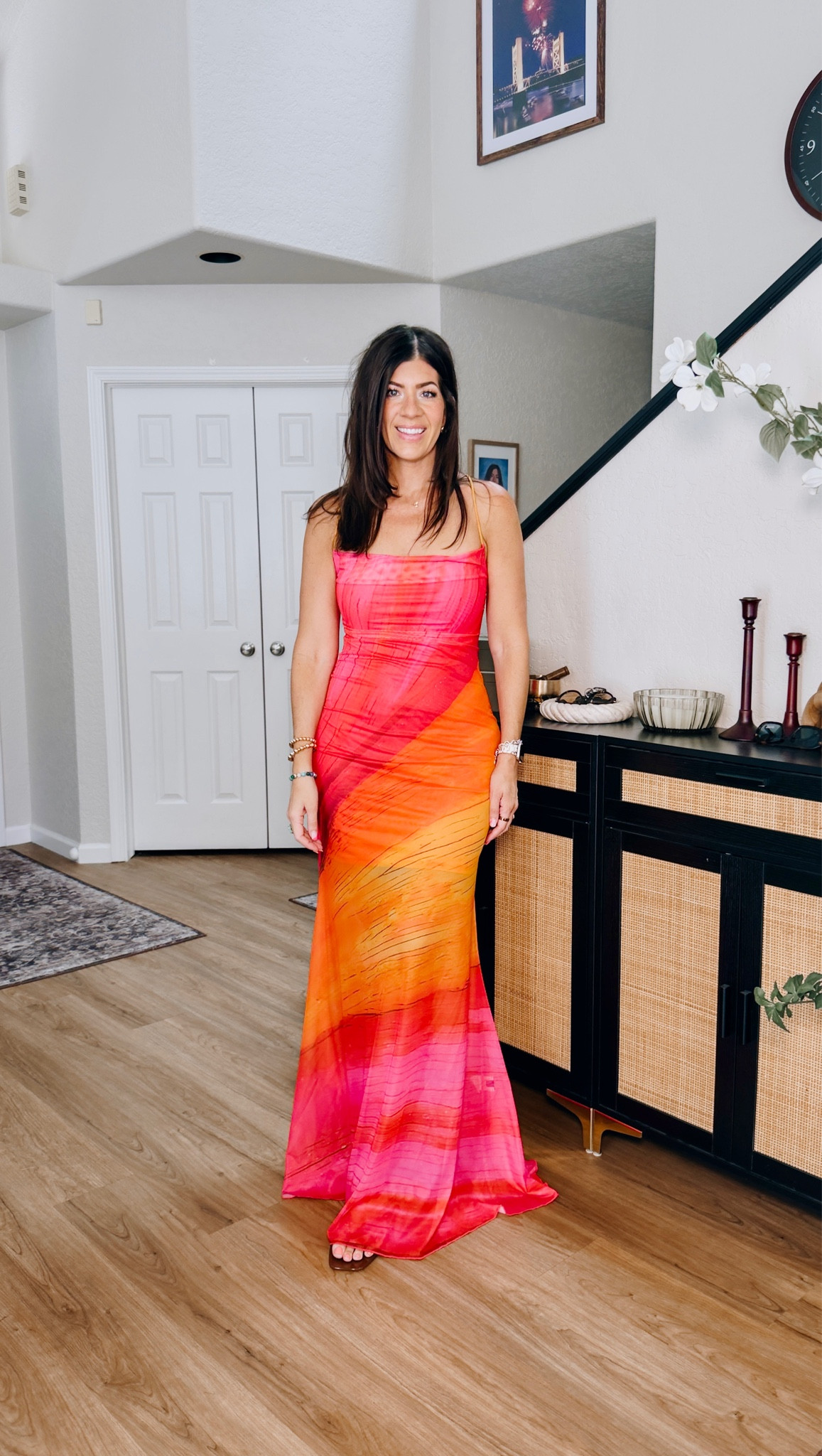 In a large rainbow dress

#LTKMidsize #LTKSaleAlert #LTKOver40