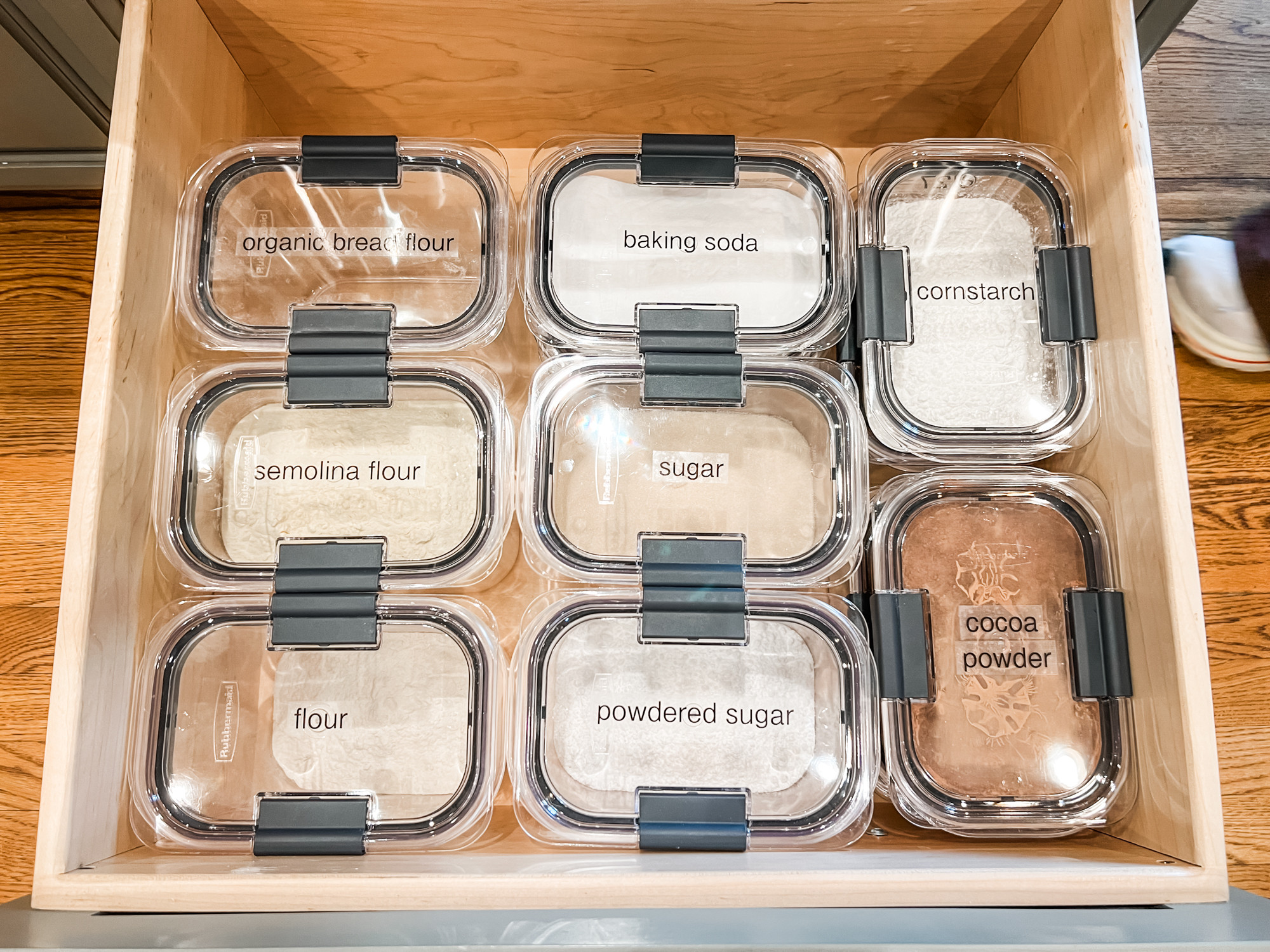 These clear-topped Rubbermaid Brilliance containers are perfect for keeping your baking supplies in order - and in a drawer. We've used this trick not only for baking but for rice, grains, dal, and more. Label the top and you'll be able to plan your next grocery trip with one glance! 

 