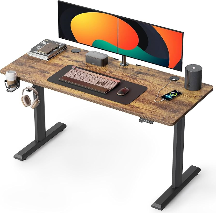 FEZIBO Height Adjustable Electric Standing Desk, 55 x 24 Inches Stand up Table, Sit Stand Home Of... | Amazon (US)