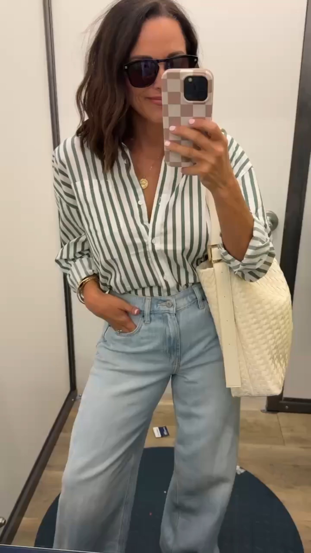Classy striped button down shirt styled with wide leg denim jeans and a woven bag, a look you can wear to run errands, meetings, and more!
Classic and chic comfy look.




Daytime look  chic style  women’s outfit




#LTKStyleTip #LTKPetite #LTKSeasonal