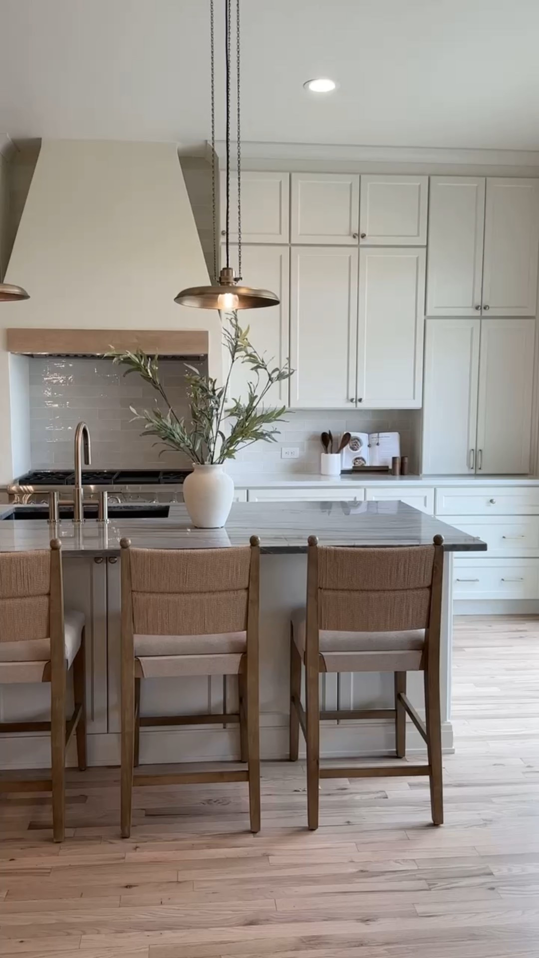 Bringing this kitchen to life was such a fun process. These pendant lights are so beautiful and the barstools have the most gorgeous texture. 

#LTKHome #LTKFamily #LTKStyleTip