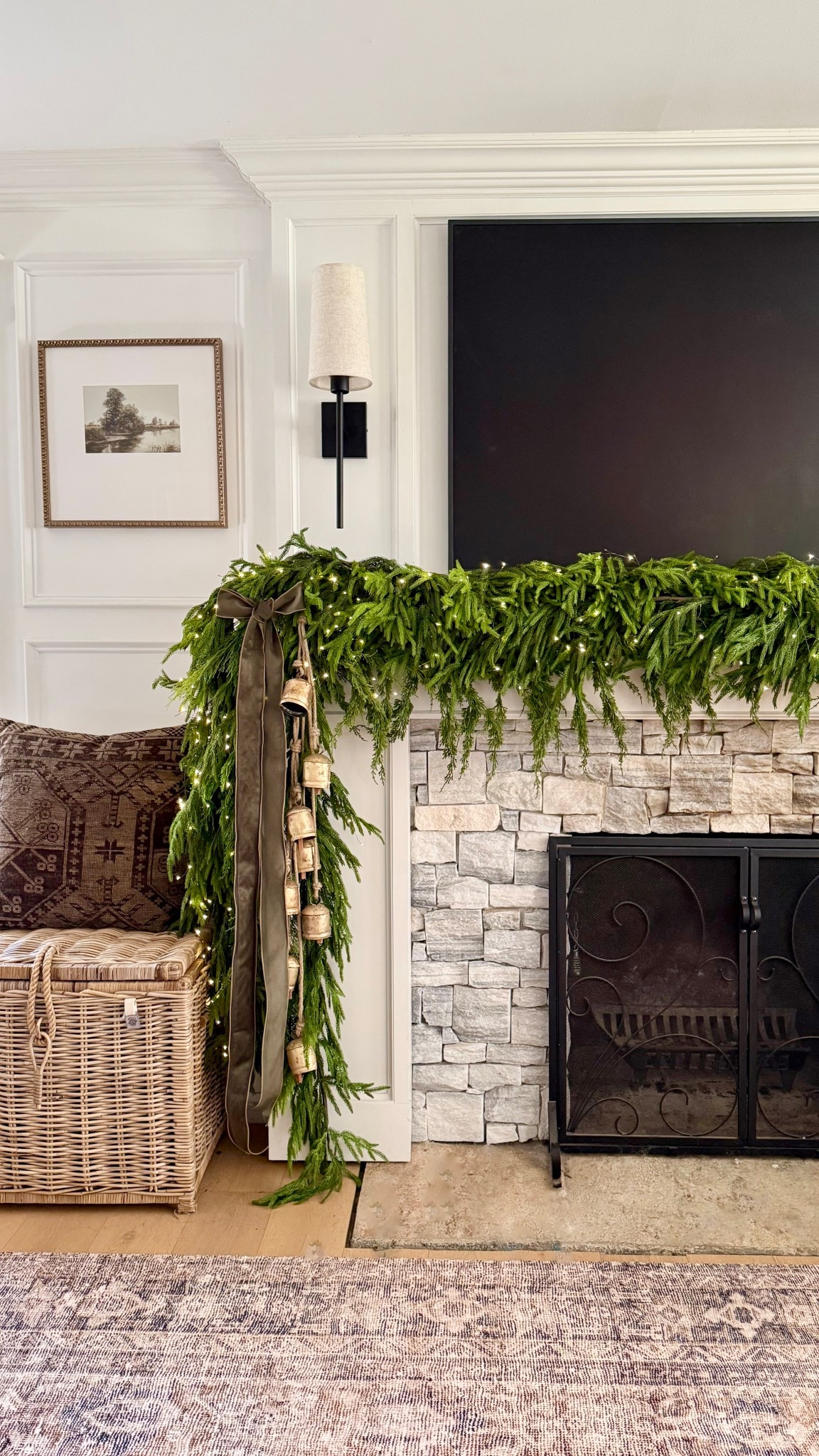 Layered draping mantel garland ✨
To achieve this look, I use several pieces of garland outlined below. I added two sets of these rustic bells, three sets of 200 warm white fairy lights, and green velvet ribbon to complete the look. For reference, my mantel is about 8 feet long. 

For the garland:
(6) Clear Command Hooks
(1) 9 ft draping cedar (lower layer)
(2) 15 ft Norfolk Pine
(1) 8 ft deluxe Norfolk Pine (top layer)
(2) mixed cedar/Norfolk (sides)
(1) 5 ft Norfolk Pine (left side) 

#LTKHoliday #LTKSeasonal #LTKHome