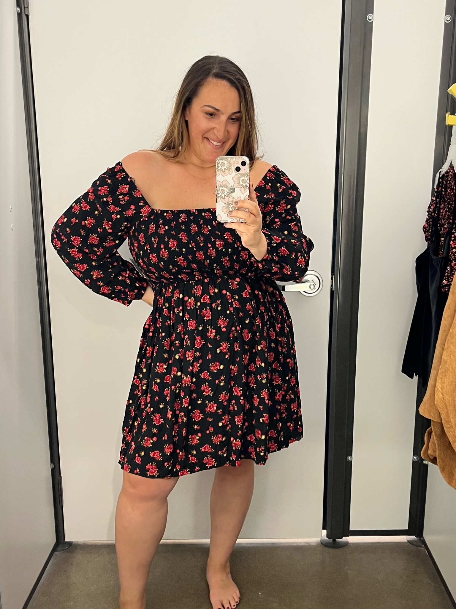 Stunning babydoll smocked too dress form Old Navy. The floral is gorgeous! Will be perfect this winter! 

#LTKSeasonal #LTKcurves #LTKunder50