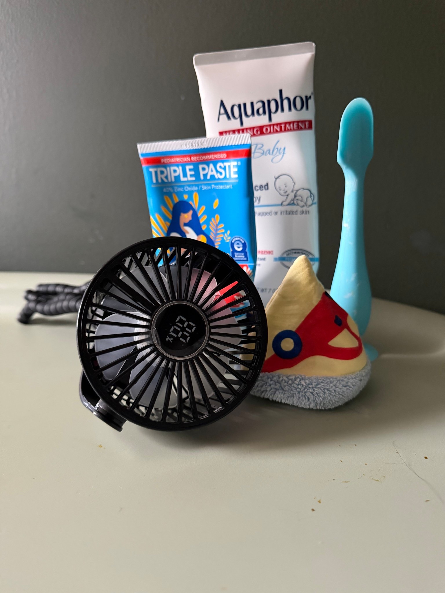 diaper change routine for my baby boy m with super sensitive skin! striller fan doubles as open air to help the oxygen dry his booty out