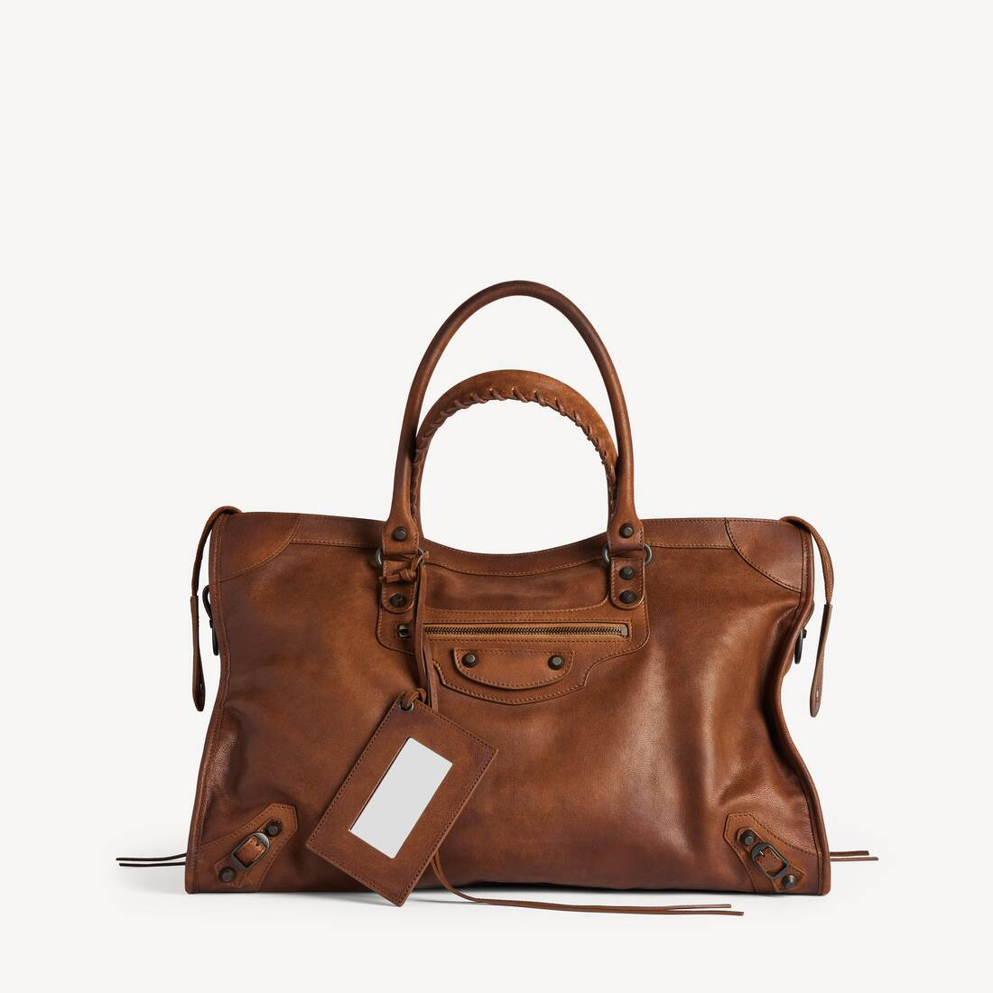 Le City Bag Large in caramel vintage goatskin with brass hardware is from look 62 of Balenciaga F... | Balenciaga